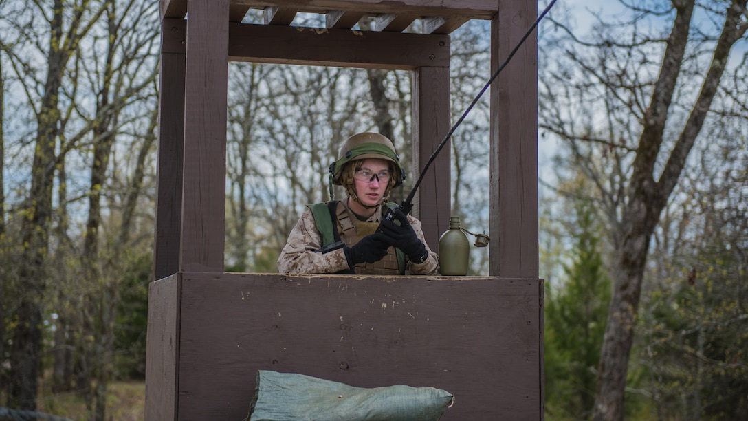 A student at the Marine Military Police Basic Course stands guard during a field exercise at Fort Leonard Wood, Missouri, April 14, 2016. The three-day exercise is the culminating event of their 70-day course. 