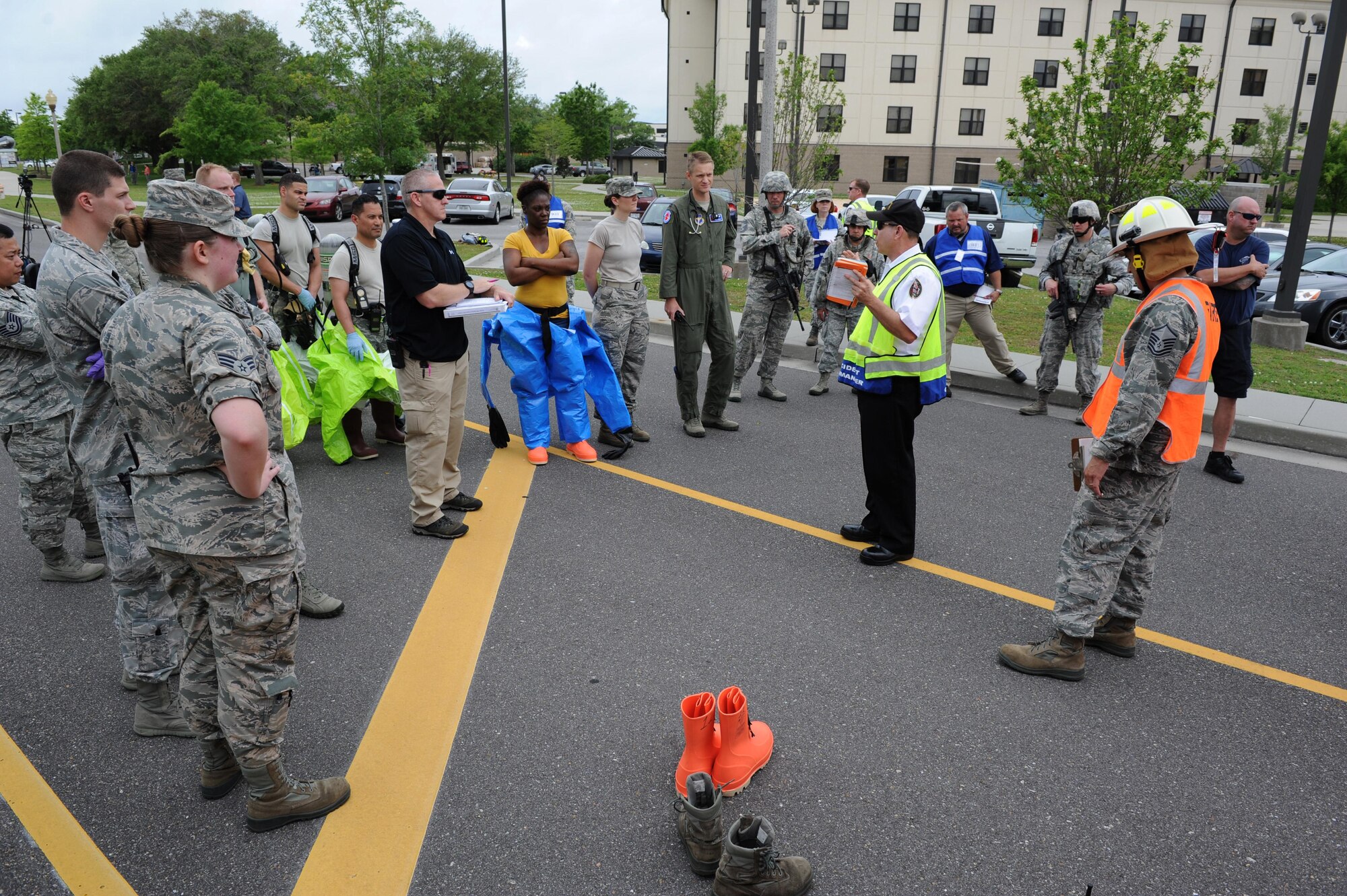 James Donnett, 81st Infrastructure Division fire chief, briefs the incident action plan during a Chemical, Biological, Radiological, Nuclear and Explosive exercise scenario, April 21, 2016, Keesler Air Force Base, Miss. The Force Protection Condition exercise scenario simulated an intruder entering the hazardous waste 90-day accumulation site, where an explosion occurred causing a mass casualty event. The exercise tested the base’s capability to react to and recover from a mass casualty event. (U.S. Air Force photo by Kemberly Groue)