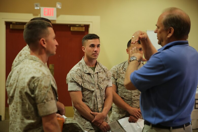 MARINE CORPS BASE CAMP PENDLETON, Calif. – Marines discuss tactical data links with a vendor at the Pacific Views Events Center during the “Tactical & Technology Day” on Camp Pendleton April 20, 2016. The exhibition was hosted by I Marine Expeditionary Force to feature expeditionary energy technology including renewable and solar technology, power and energy distribution, generators, and batteries. (U.S. Marine Corps photo by Lance Cpl. Shellie Hall/ Not Released)
