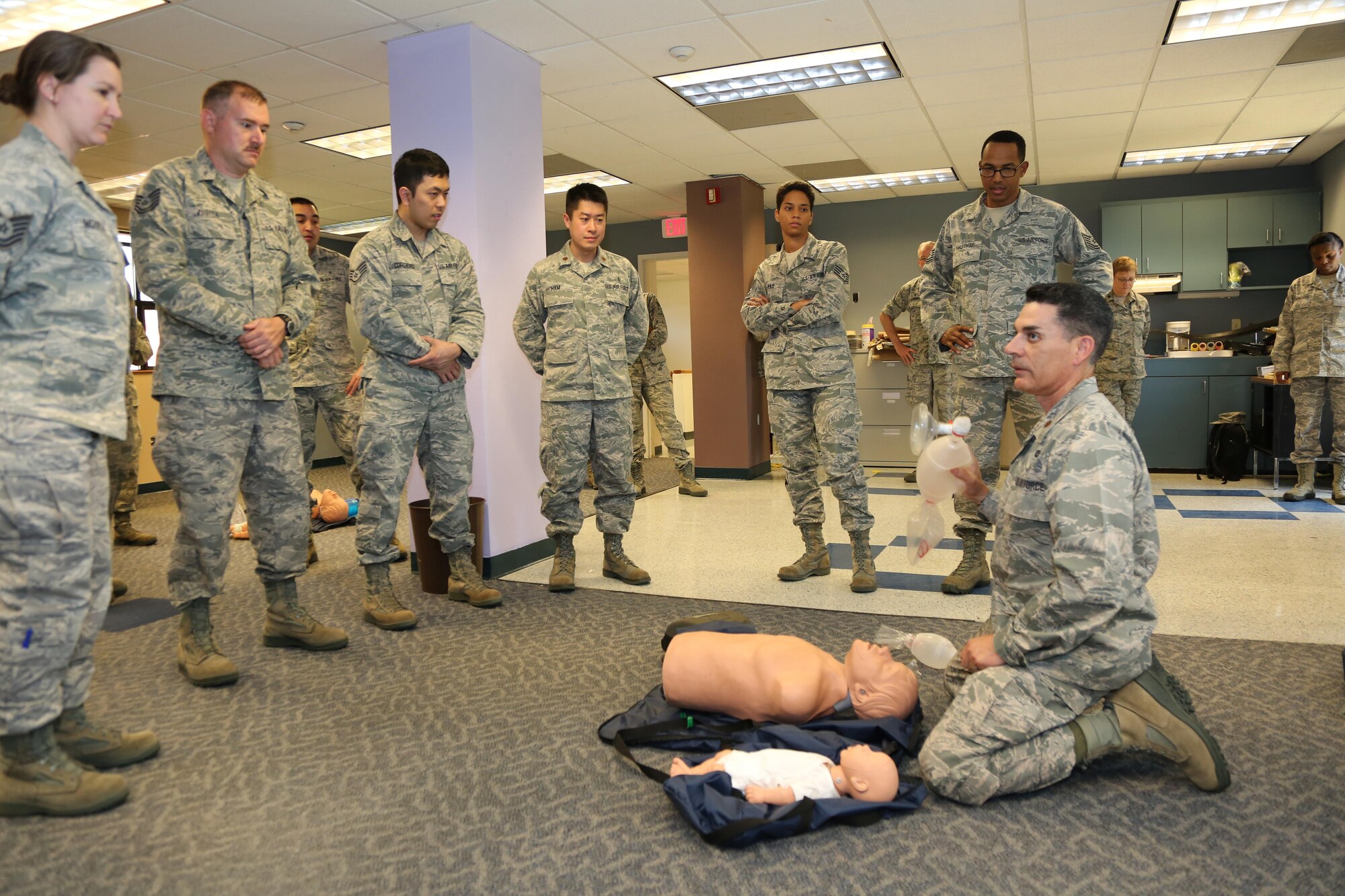 Citizen Airmen from the 349th Air Mobility Wing take part in emergency medical technician training in the 349th Medical Squadron’s new training room, April 17, 2016 at Travis Air Force Base, Calif.  The repurposed office space will improve the squadron’s ability to conduct a wide range of skill and qualification training.  (U.S. Air Force photo/Lt. Col. Robert Couse-Baker/ Released)
