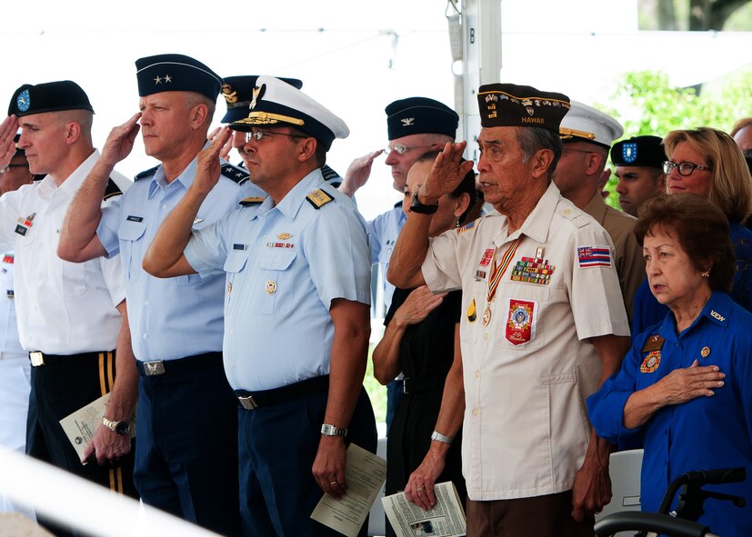 U.S. Air Force Maj. Gen. Thomas Harwood III (second from left), Mobilization Assistant to the commander of Pacific Air Forces, and event guests pay their respects during the National Anthem at the 74th Commemoration of “Araw ng Kagitingan” or Philippine Day of Valor, April 16, 2016, at the National Memorial Cemetery of the Pacific, Honolulu, Hawaii. The memorial ceremony honored Filipino-American veterans of World War II, and is held on the anniversary of the fall of Bataan and the Bataan Death March which claimed approximately 10,000 Filipino and American lives in April of 1942. (Photo courtesy of the Philippine Consulate General Honolulu)
