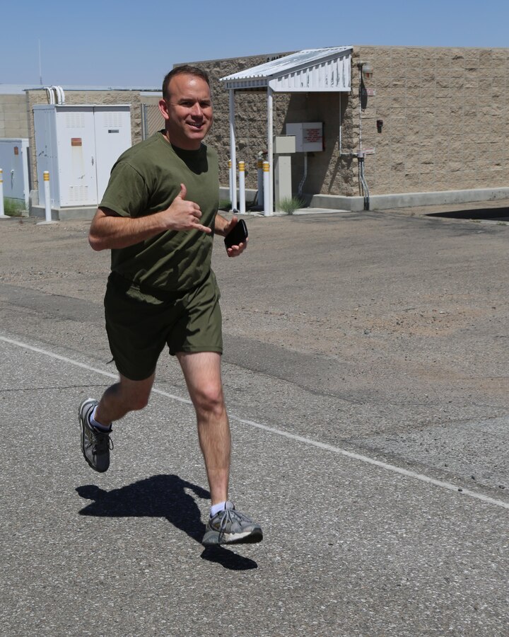 Master Sgt. James Lowery, operations chief, represents Fleet Support Division at the NO MORE 5K aboard Marine Corps Logistics Base Barstow, Calif., April 15. The 5K was intended to draw awareness to domestic violence and sexual assault prevention. 