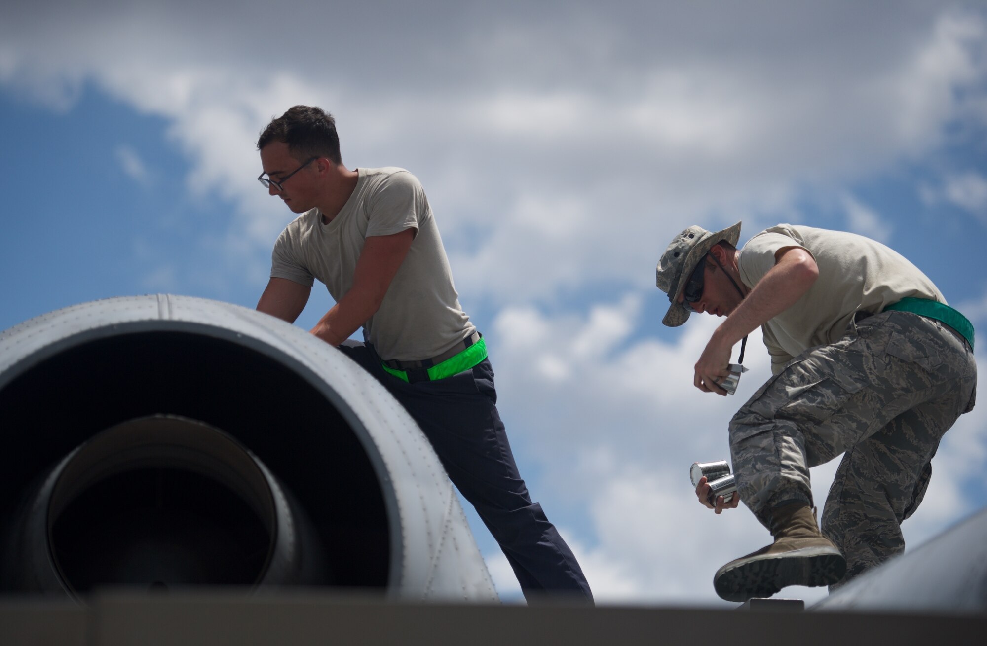 U.S. Air Force Senior Airman Matthew Rentschler, A-10 Thunderbolt II crew chief, and Staff Sgt. Joseph Defino, aerospace propulsion technician, both deployed from Osan Air Base, Republic of Korea, check the engine of an A-10C after the aircraft completed maritime domain awareness mission over the waters west of the Philippines April 21, 2016. The aircraft and Airmen are deployed in support of the first iteration of U.S. Pacific Command’s Air Contingent, which was stood up at the invitation of the Philippine government in order to promote interoperability, build upon the relationship with our Philippine counterparts, and reaffirm the U.S. commitment to the Indo-Asia-Pacific region. (U.S. Air Force photo by Capt. Susan Harrington)