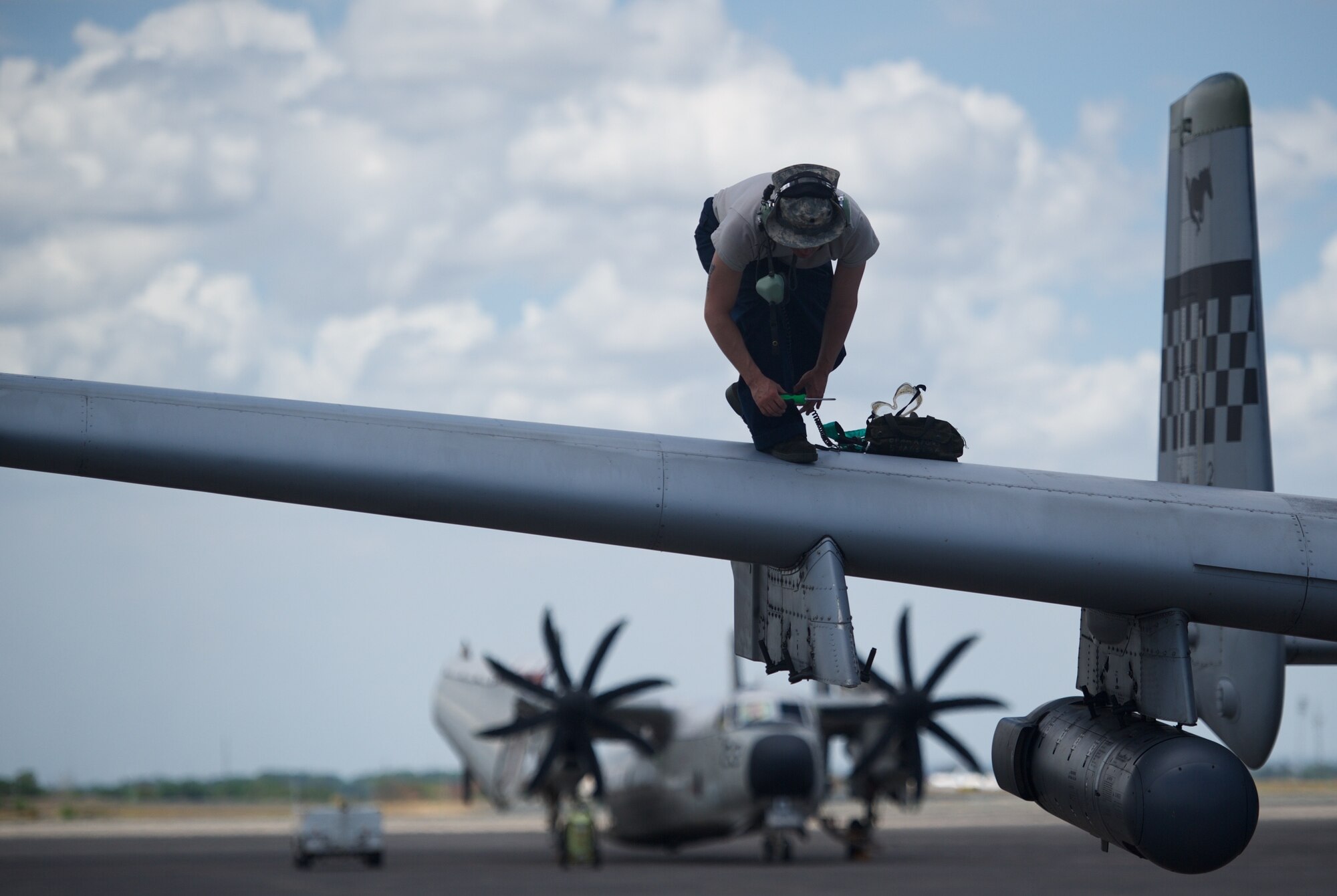 U.S. Air Force Staff Sgt. Arrec Chetwood tightens a screw on the wing of an A-10C Thunderbolt II after the aircraft conducted a mission in the vicinity of Scarborough Shoal providing transparent air and maritime situational awareness April 21, 2016, at Clark Air Base, Philippines. Chetwood, who is deployed from Osan Air Base, Republic of Korea, is part of the first iteration of U.S. Pacific Command’s Air Contingent, which was stood up at the invitation of the Philippine government in order to build upon the relationship with Philippine counterparts, and lay the foundation for joint air patrols to complement ongoing joint maritime patrols. (U.S. Air Force photo by Capt. Susan Harrington)