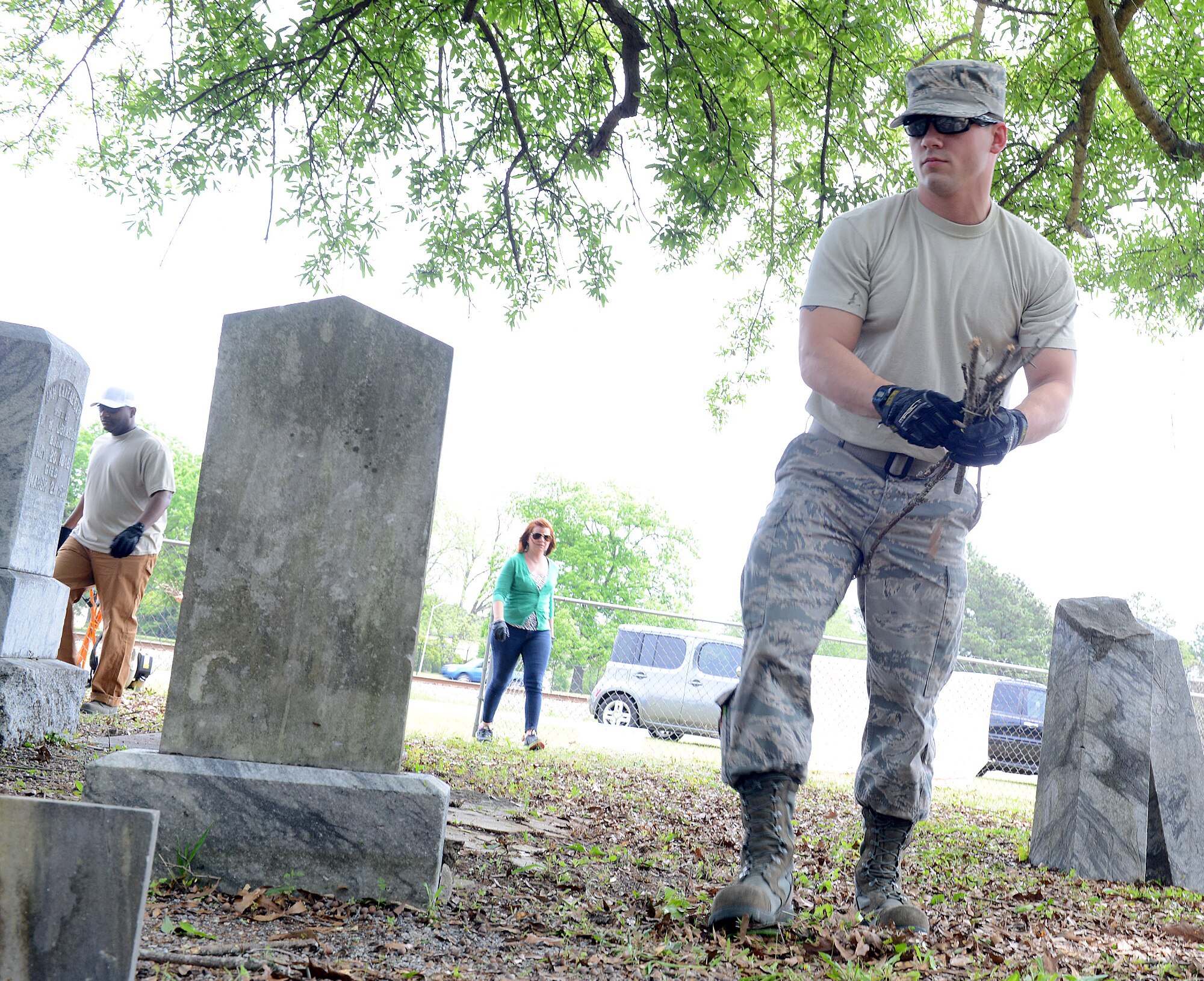 Senior Airman Will Jenkins, 116th Air Control Wing maintenance squadron, helps with the Bryant Cemetery clean up, April 20, 2016. (U.S. Air Force photo by Tommie Horton)
