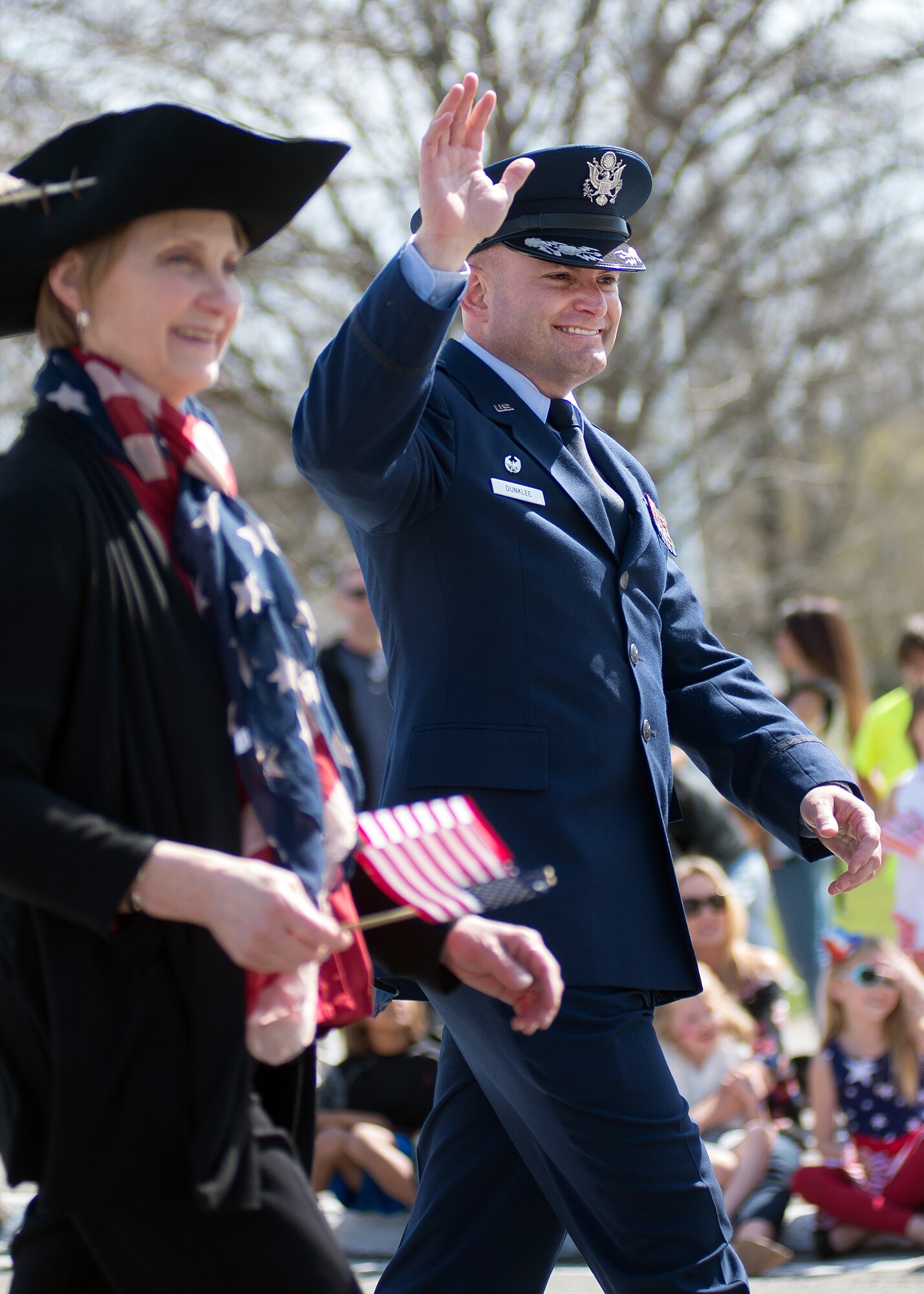 Col. David R. Dunklee, 66th Air Base Group commander, walks with Judy Crocker, a member of the Lexington School Committee, in Lexington, Mass., during Patriots’ Day activities April 18. The Patriots’ Day Afternoon Parade was one of many the town held as part of this year's events. (U.S. Air Force photo by Mark Herlihy)