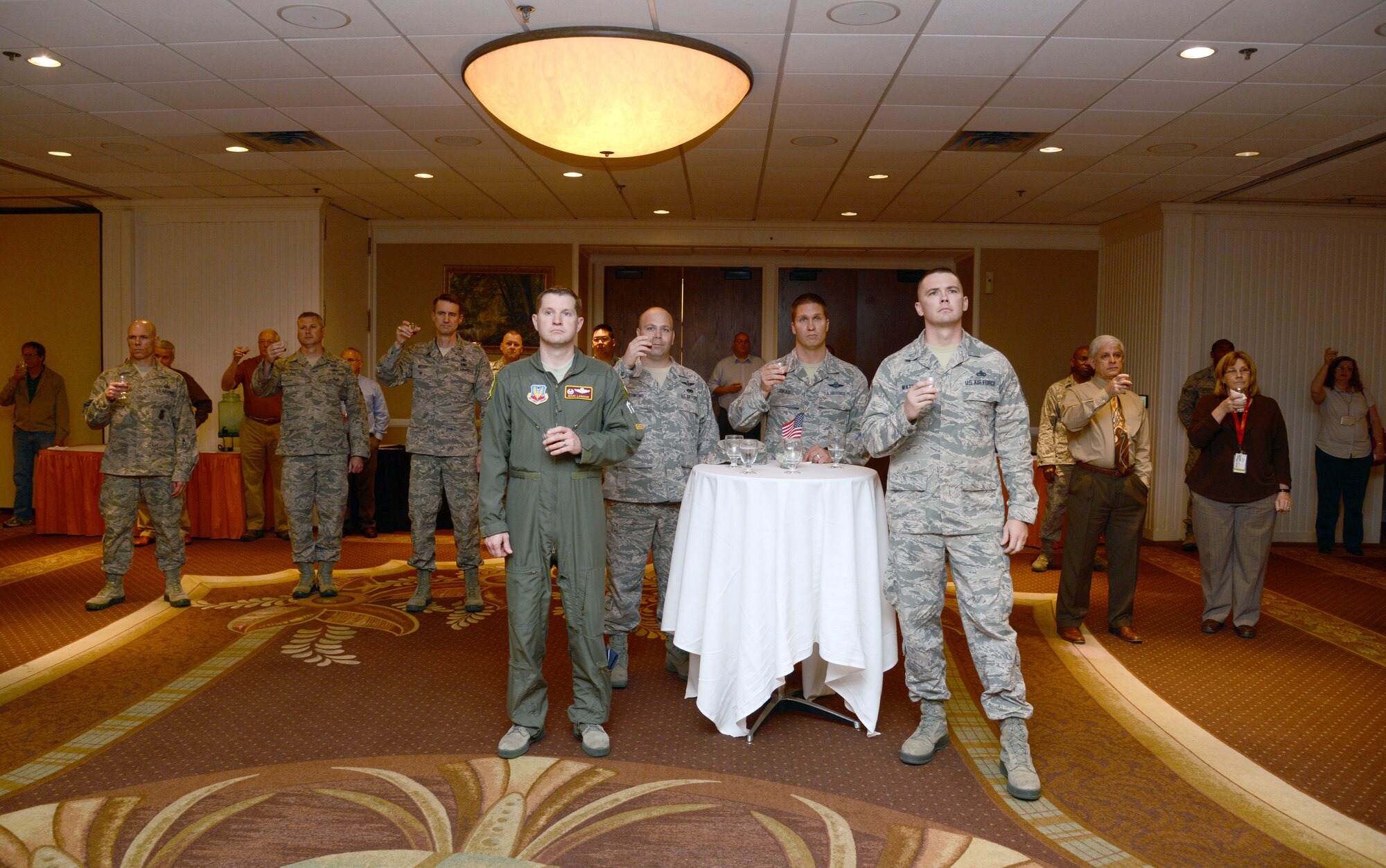 The Tinker Club and Moet Hennessy USA hosted a toast to the Doolittle Tokyo Raiders on April 18 to honor the 80 men, led by Lt. Col. James “Jimmy” Doolittle, on April 18, 1942, during World War II, who flew a bombing mission to Japan after the bombing of Pearl Harbor. The mission was basically a suicide mission, especially having to launch 200 miles off the Japanese coast knowing there wasn’t enough fuel to return to the aircraft carrier. Sixty-two out of the 80 survived and the surviving Raiders have met annually on April 18 since the 1950s to toast their fallen comrades. On Nov. 9, 2013, the four remaining Raiders met (one was too ill for the ceremony, but watched online) one last time and opened the bottle of cognac gifted to their leader almost 56 years before. The significance of their last toast together symbolized the completion of their mission. Currently, only two Doolittle Tokyo Raiders survive: Lt. Col. Richard Cole and Staff Sgt. David Thatcher. (Air Force photo by Kelly White/Released)