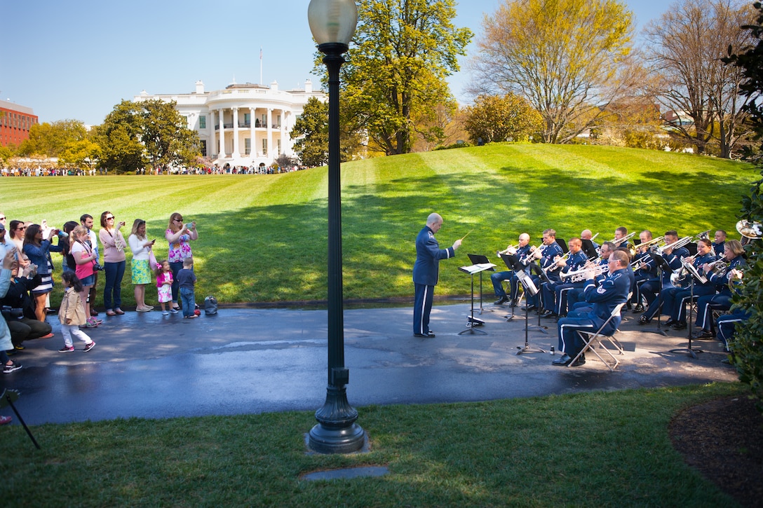 The Ceremonial Brass performs for visitors on the White House lawn during the Spring 2016 White House Garden Tour under the direction of Maj. Matthew Henry. The band has performed for this event many times since its beginning in 1972. (U.S. Air Force photo by Technical Sgt. Matthew Shipes).