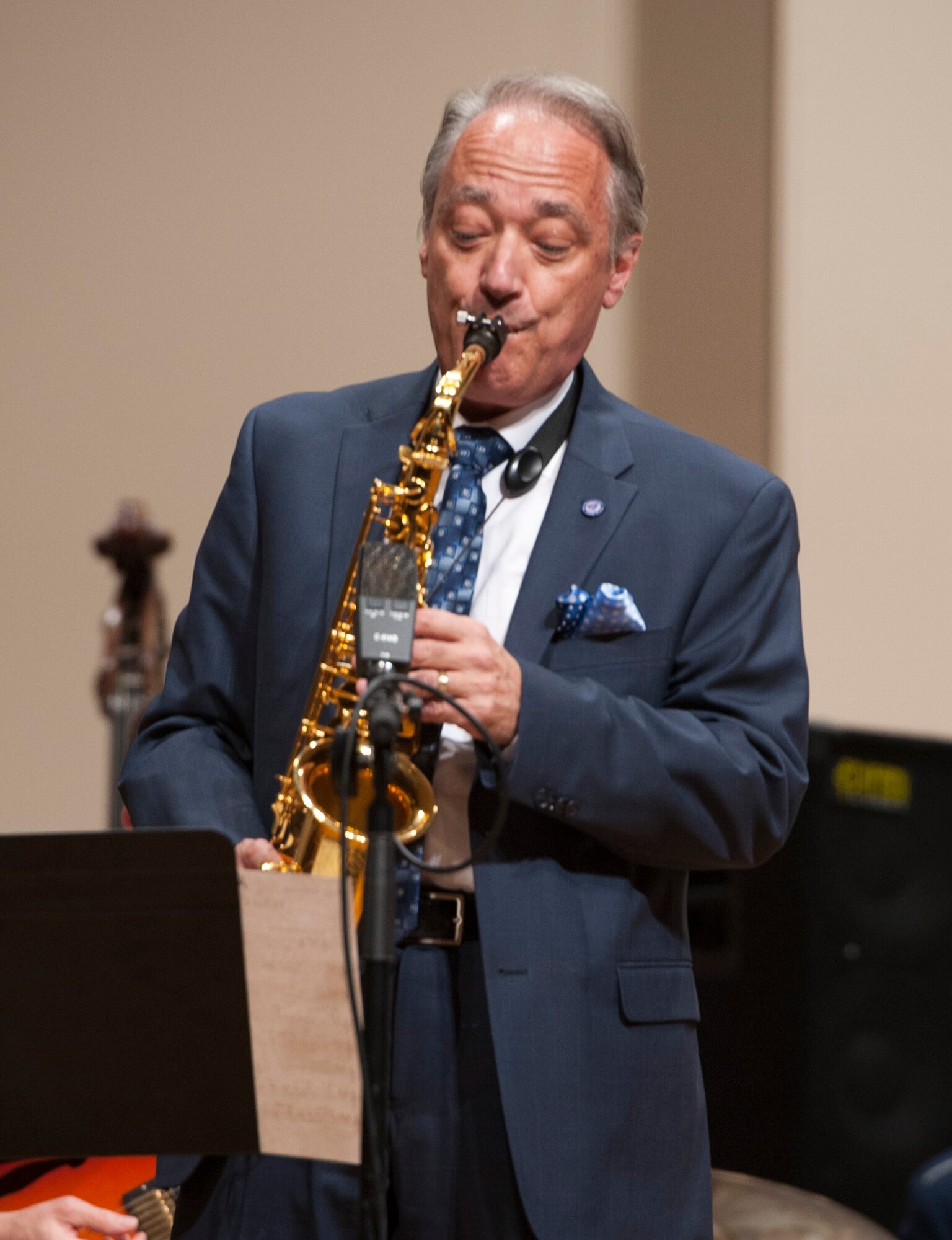 Retired Chief Master Sgt. Joe Eckert performs a solo with the Airmen of Note during a concert at Texas Christian University in Fort Worth, Texas, April 18. Eckert, who spent 20 years with the band, is now the director of the jazz program and the saxophone professor at TCU. (U.S. Air Force photo/ Tech. Sgt. James Bolinger)