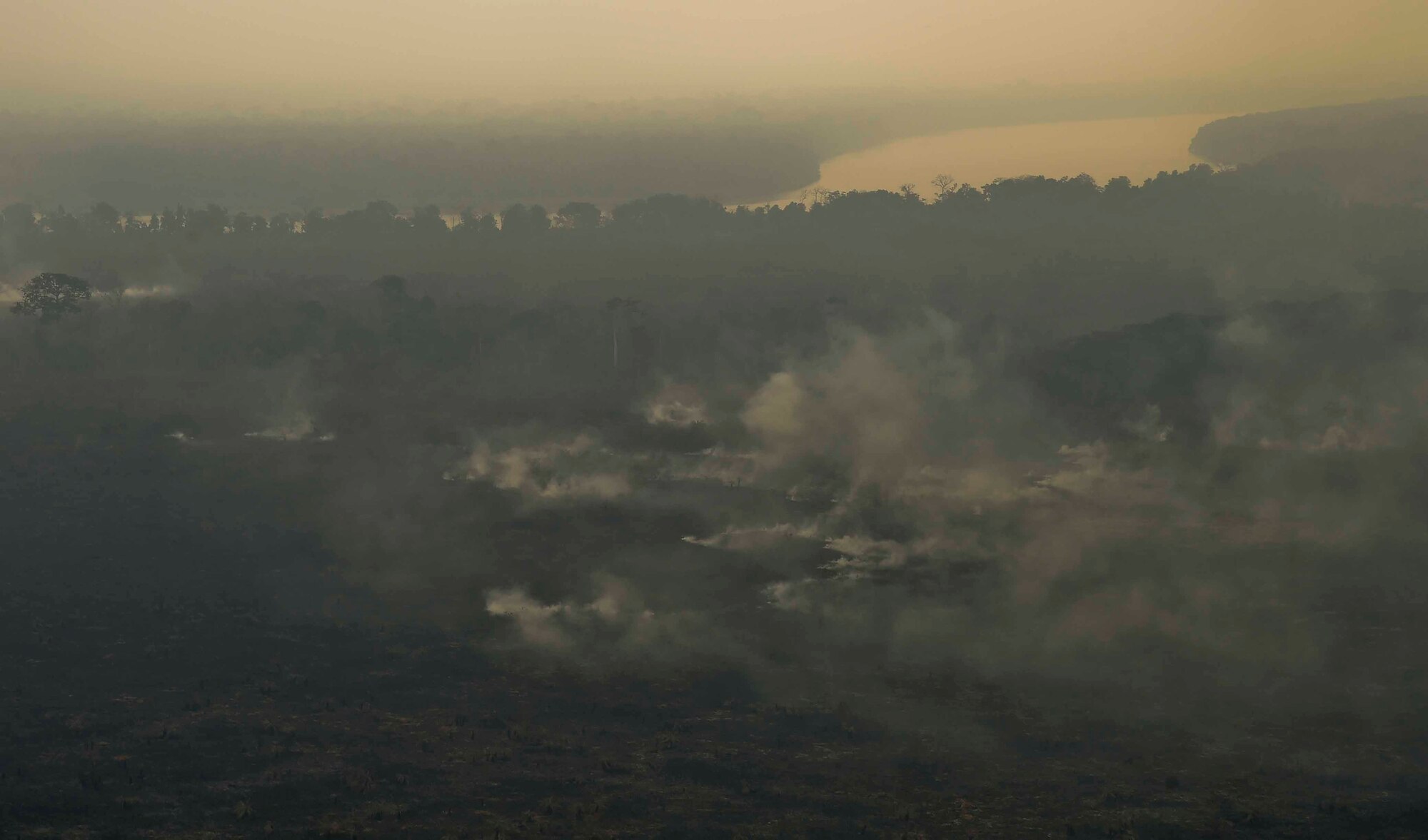 Wildfire scorches land in the Darién province of Panama, April 17, 2016. The fire, which is believed to have started April 4, grew exponentially, prompting the U.S. Embassy in Panama to request an aerial support package from JTF-B consisting of aircraft from the 1st Battalion, 228th Aviation Regiment, Soto Cano Air Base, Honduras, to help contain the fire. Approximately 45,000 people reside in the Darién Province, so stopping the spread of the fire from the undeveloped swampland and forests to residential areas was of utmost importance. (U.S. Air Force photo by Staff Sgt. Siuta B. Ika)
