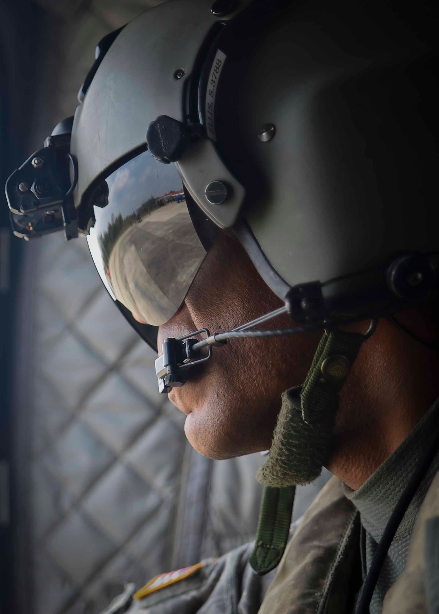 U.S. Army Chief Warrant Officer Sean Ellis, 1st Battalion, 228th Aviation Regiment CH-47 Chinook pilot, prepares for a firefighting mission in the Darién province of Panama, April 17, 2016. Ellis was one of approximately 25 Joint Task Force-Bravo members sent to Panama to help with the firefighting efforts against the fires, which are believed to have started April 4 and grew exponentially, prompting the Government of Panama, via the U.S. Embassy in Panama, to request an aerial support package from JTF-Bravo. (U.S. Air Force photo by Staff Sgt. Siuta B. Ika)