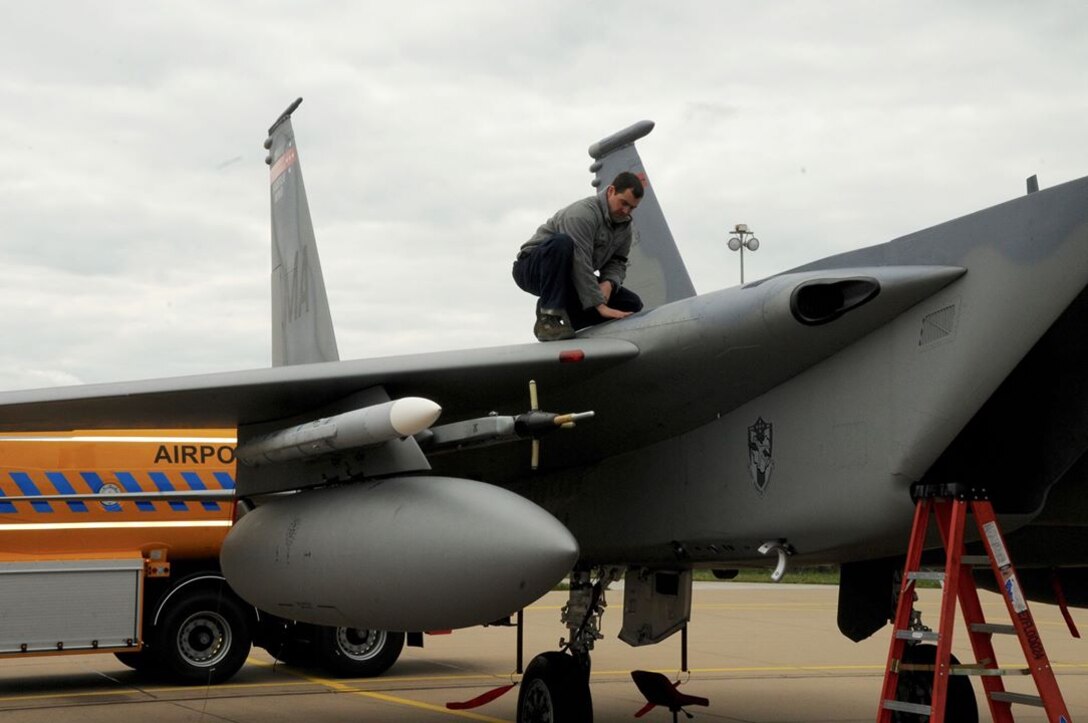 U.S. Air Force and Massachusetts Air National Guard Tech. Sgt. Daniel Masciadrelli, 104th Maintenance Squadron, conducts a visual inspection of the top of a U.S. Air Force F-15C Eagle aircraft after being flown April 18, 2016, during exercise Frisian Flag at Leeuwarden Air Base, Netherlands. The F-15s will conduct training with more than 70 aircraft from the Netherlands, Australia, Belgium, Finland, France, Germany, Poland, Norway, and the United Kingdom during Frisian Flag 2016 at Leeuwarden, April 11-22, 2016. (U.S. Air National Guard photo by 1st Lt. Bonnie Harper/Released)

