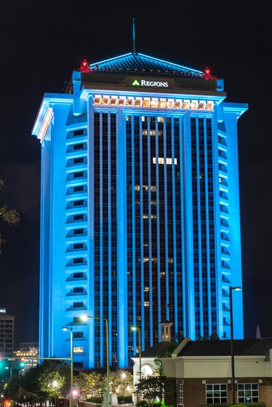 The Retirement Systems of Alabama Dexter Avenue building is illuminated in downtown Montgomery, Ala., April 20, 2016. LaNessa Howard, Sexual Assault Response Coordinator, coordinated with the building administrators to illuminate the structure teal for Sexual Assault Awareness Month. (U.S. Air Force photo/Trey Ward)