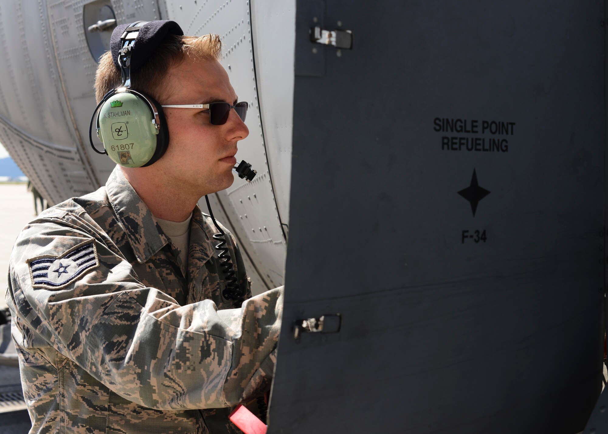 Staff Sgt. Kraig Stahlman, Pittsburgh Air Reserve Station 911th Maintenance Squadron crew chief, fills a C-130 Hercules with fuel during Saber Junction 16, April 14, 2016, at Aviano Air Base, Italy. The 31st Logistics Readiness Squadron provided fuel for all 18 visiting aircraft. (U.S. Air Force photo by Senior Airman Austin Harvill/Released)