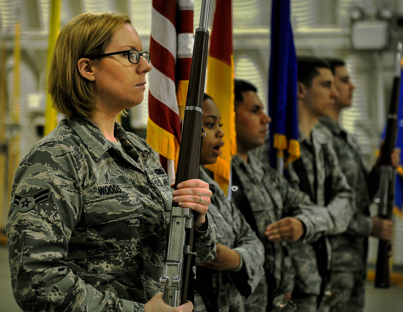 Airman 1st Class Kara Woods, 86th Communications Squadron postal specialist (left), practices with fellow Ramstein Honor Guard members March 31, 2016, at Ramstein Air Base, Germany. Woods has been a member of the base Honor Guard since January and has learned honor, discipline and precision. (U.S. Air Force photo/Senior Airman Larissa Greatwood)