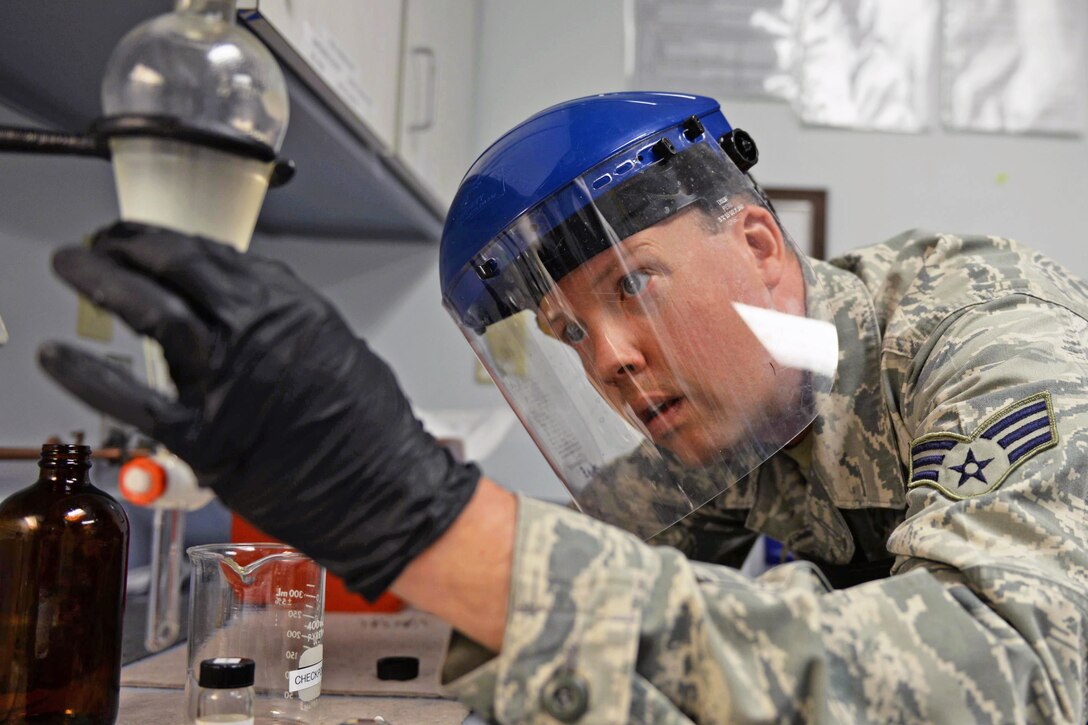 Air National Guard Senior Airman Timothy D. Burrows performs a quality control test on jet aircraft fuel at Pease Air National Guard Base, N.H., April 21, 2016. Burrows is a 157th Logistics Readiness Squadron fuels labs technician. Air National Guard photo by Staff Sgt. Curtis J. Lenz