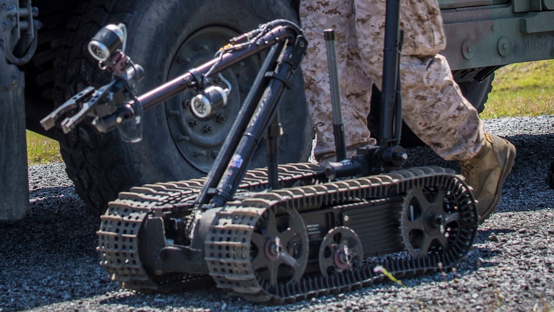 A Marine prepares a bomb disposal robot to investigate a simulated Improvised Explosive Device during training at Marine Corps Air Station Beaufort, South Carolina, April 19, 2016. The 5-day event is being conducted to train and prepare the air station’s Explosive Ordnance Disposal personnel to an elevated standard in their ability to neutralize IEDs and support intelligence operations. The Marine is a technician with EOD.
