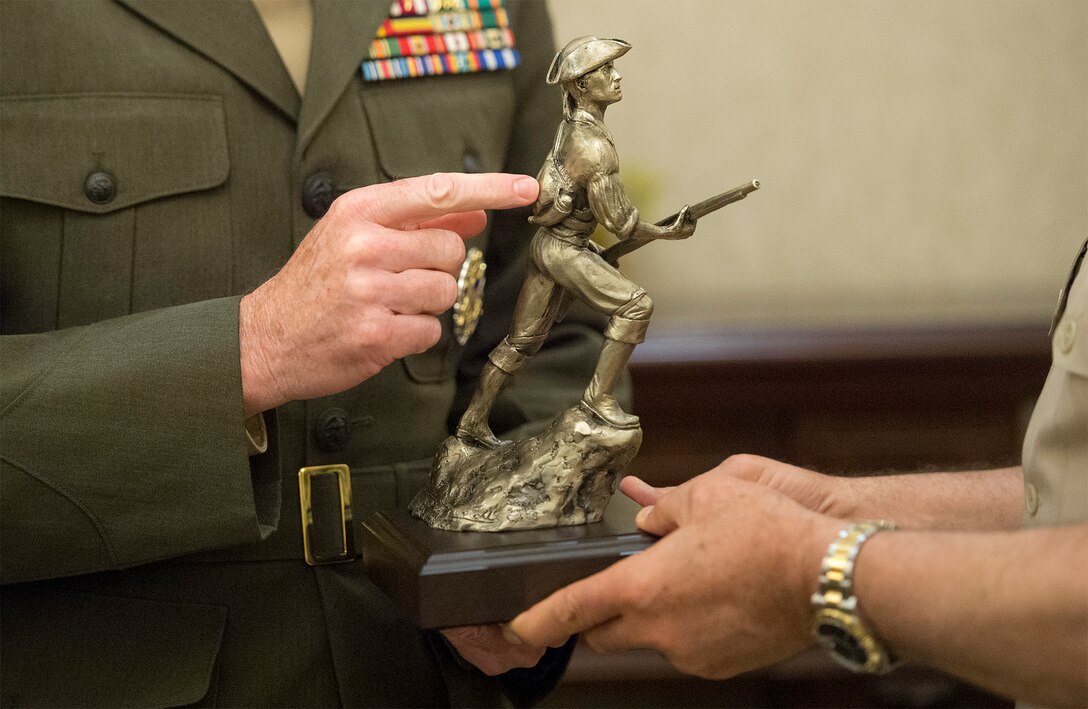 Marine Corps Gen. Joe Dunford, chairman of the Joint Chiefs of Staff, presents a gift to Egyptian Chief of the Armed Forces Lt. Gen. Mahmoud Hegazy at the Ministry of Defense in Cairo, April 23, 2016. DoD photo by Navy Petty Officer 2nd Class Dominique A. Pineiro