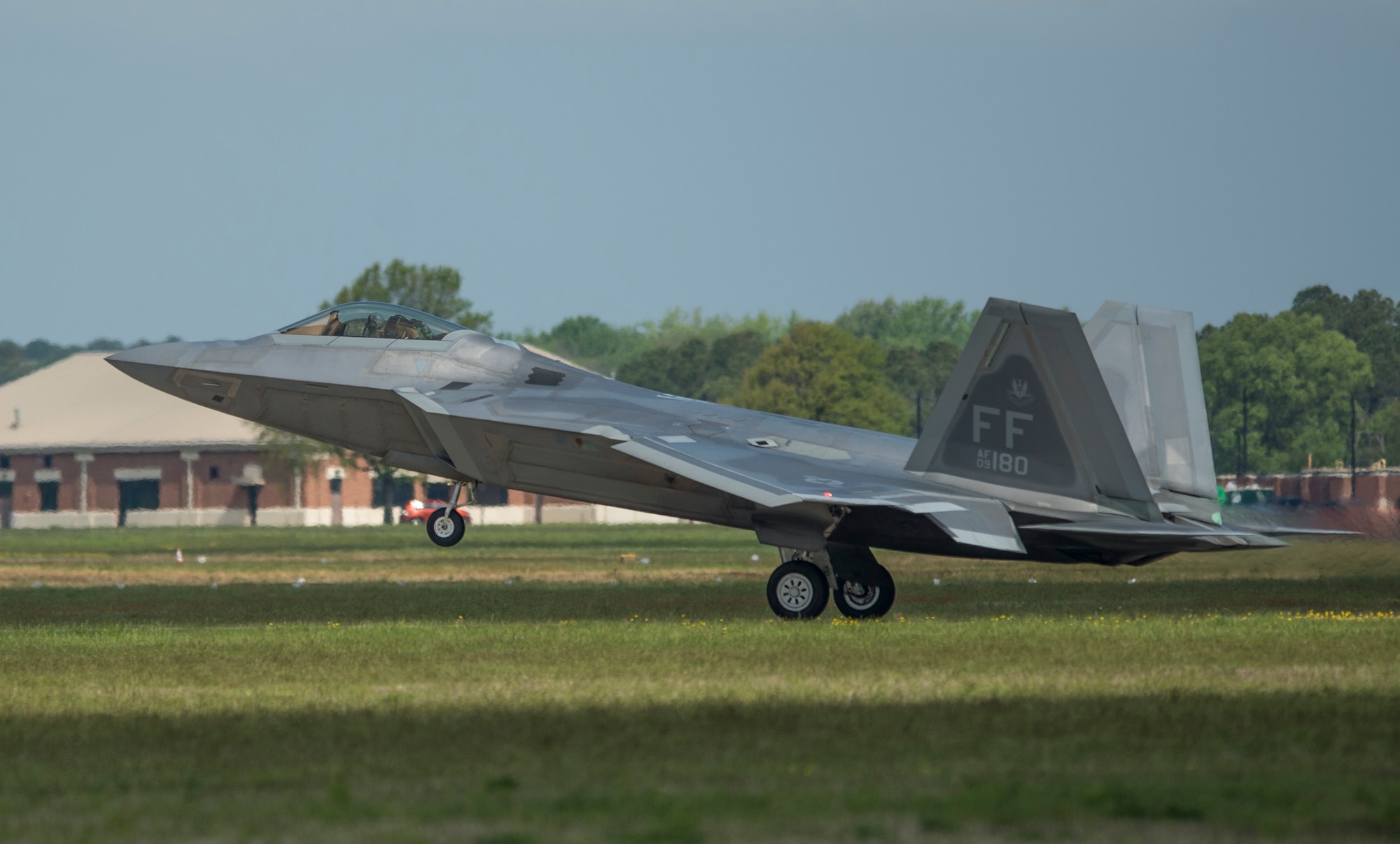 An F-22 Raptor lands during the AirPower over Hampton Roads Open House at Langley Air Force Base, Va., April 23, 2016. The F-22, a critical component of the Global Strike Task Force, is designed to project air dominance, rapidly and at great distances, and defeat threats attempting to deny access to our nation's Coast Guard, Air Force, Army, Navy and Marine Corps. (U.S. Air Force photo by Senior Airman Kayla Newman)