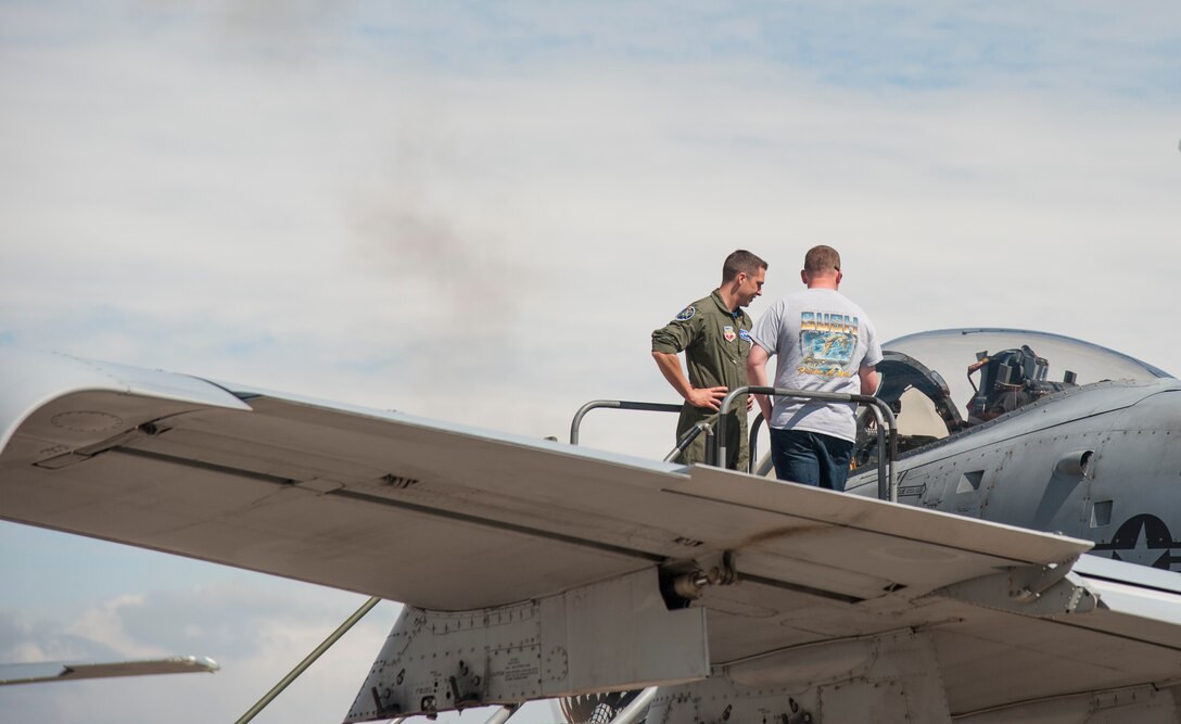 A U.S. Air Force A-10 Thunderbolt II pilot shows off the aircraft’s capabilities to an individual during the AirPower over Hampton Roads Open House at Langley Air Force Base, Va., April 23, 2016. The A-10 Thunderbolt II has excellent maneuverability at low air speeds and altitude, and is a highly accurate and survivable weapons-delivery platform. (U.S. Air Force photo by Senior Airman Kayla Newman)