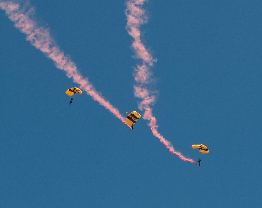 The U.S. Army Golden Knights parachute team perform a jump for the AirPower over Hampton Roads Open House grand opening at Langley Air Force Base, Va., April 23, 2016. The demonstration teams, which use five dedicated aircraft, perform at more than 100 events each year. (U.S. Air Force photo by Airman 1st Class Kaylee Dubois)