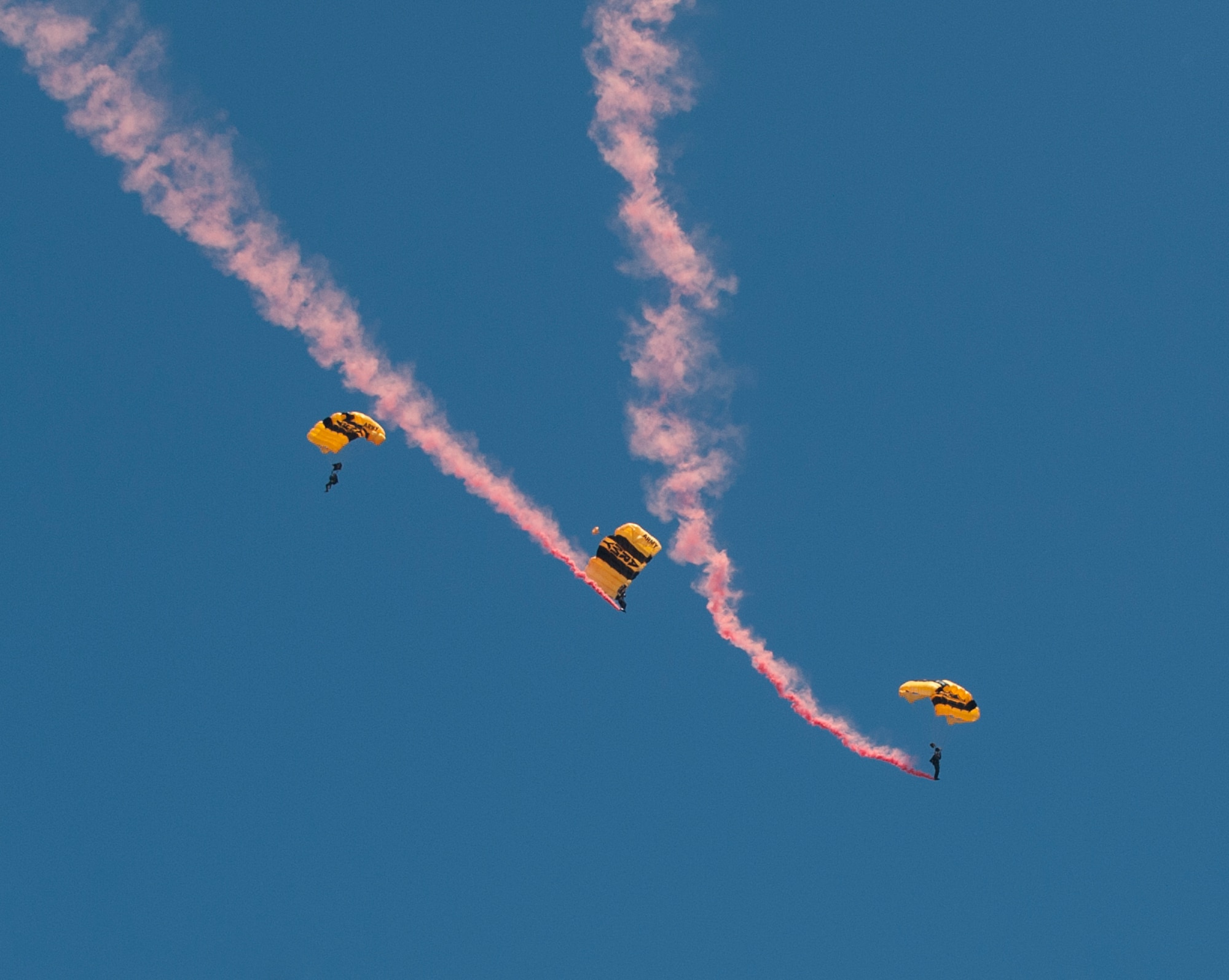 The U.S. Army Golden Knights parachute team perform a jump for the AirPower over Hampton Roads Open House grand opening at Langley Air Force Base, Va., April 23, 2016. The demonstration teams, which use five dedicated aircraft, perform at more than 100 events each year. (U.S. Air Force photo by Airman 1st Class Kaylee Dubois)