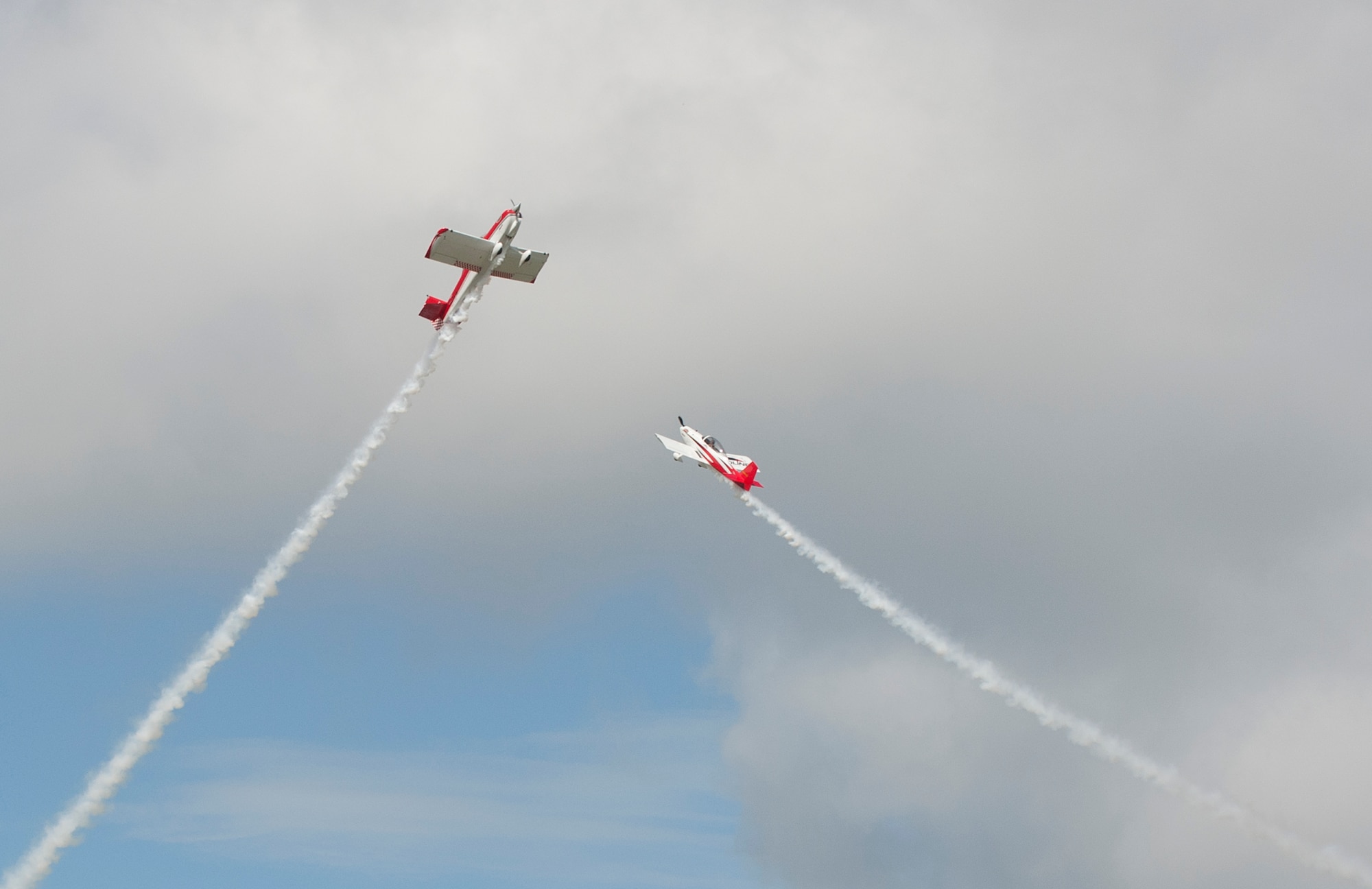 RedLine Airshows provides an aerobatic performance during AirPower over Hampton Roads at Langley Air Force Base, Va., April 23, 2016. Pilots, Ken Reider and Jon Thocker, have flewn formation together for more than 10 years. (U.S. Air Force photo by Airman 1st Class Kaylee Dubois)