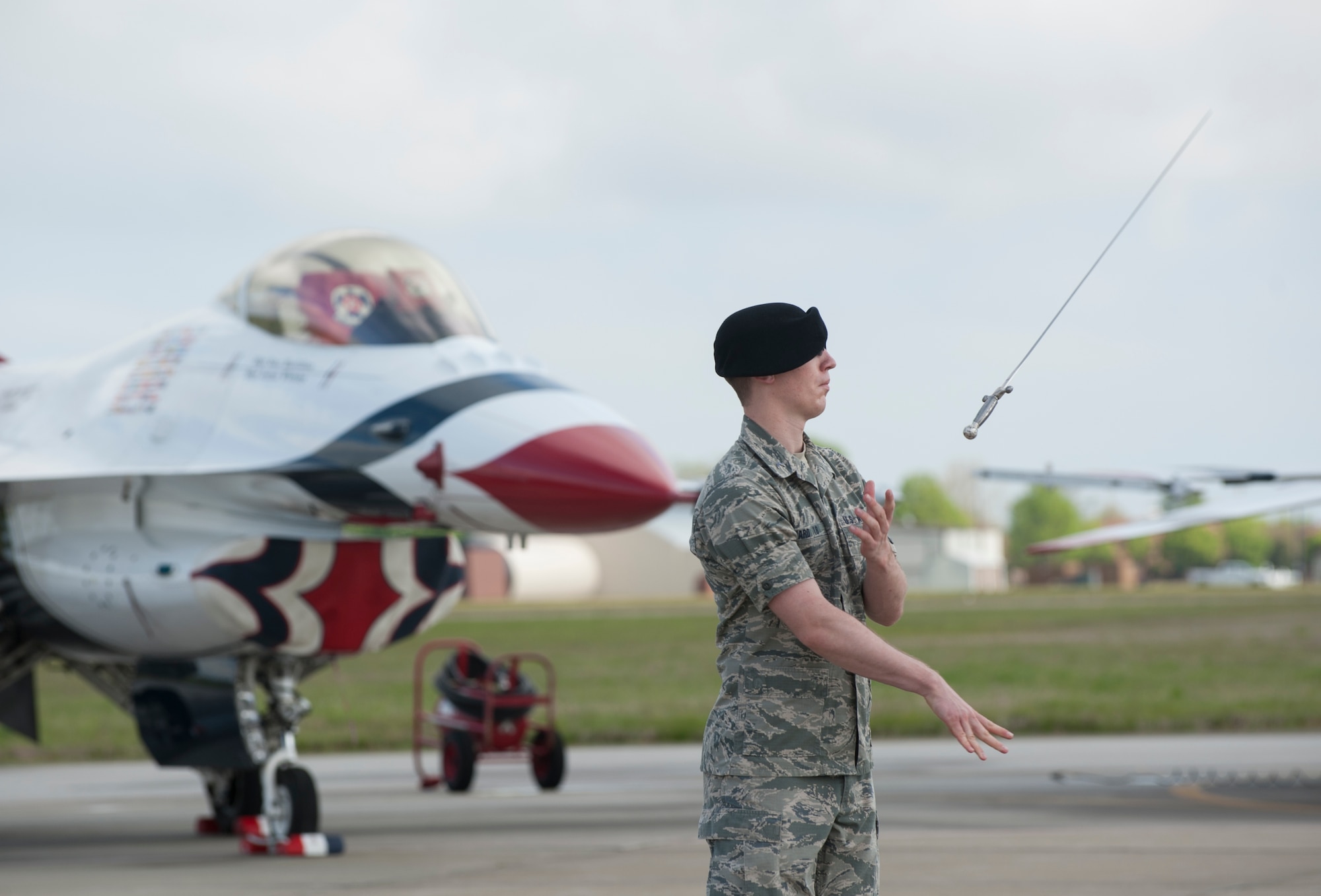 A cadet with the U.S. Air Force Academy Saber Drill Team performs during the AirPower over Hampton Roads Open House at Langley Air Force Base, Va., April 23, 2016. The open house aims to educate the public on past and present Air Force aerial capabilities, increase recruiting and show appreciation to the local community. (U.S. Air Force photo by Airman 1st Class Kaylee Dubois)
