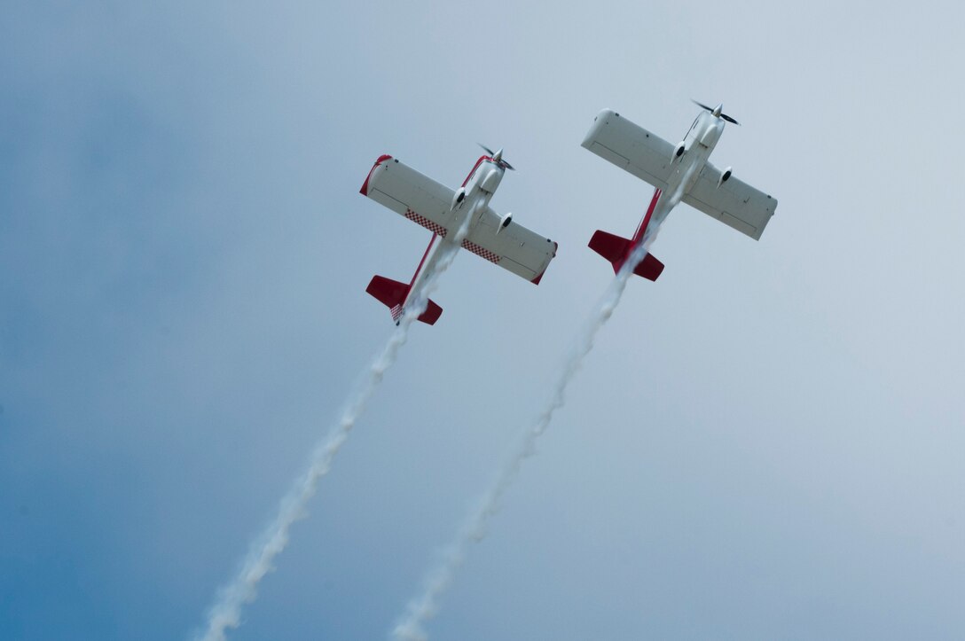 RedLine AirShows flyers perform aerobatic tricks during AirPower over Hampton Roads at Langley Air Force Base, Va., April 23, 2016. Their performance is comprised of opposing, inverted and formation maneuvers. (U.S. Air Force photo by Staff Sgt. Natasha Stannard)