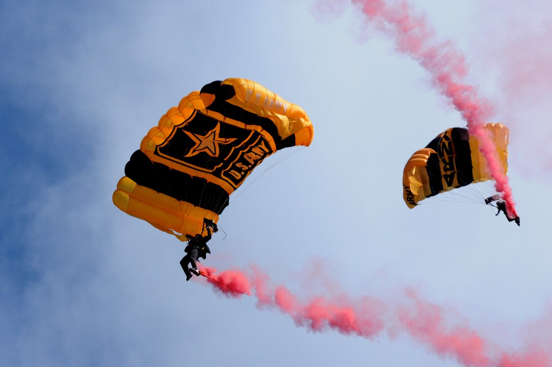 Members of the U.S. Army Golden Knights parachute team descend from a jump during the AirPower over Hampton Roads Open House at Langley Air Force Base, Va., April 23, 2016. The Golden Knights are one of three Department of Defense-sanctioned aerial demonstration teams, along with the U.S. Navy Blue Angels and the U.S. Air Force Thunderbirds. (U.S. Air Force photo by Staff Sgt. Natasha Stannard)