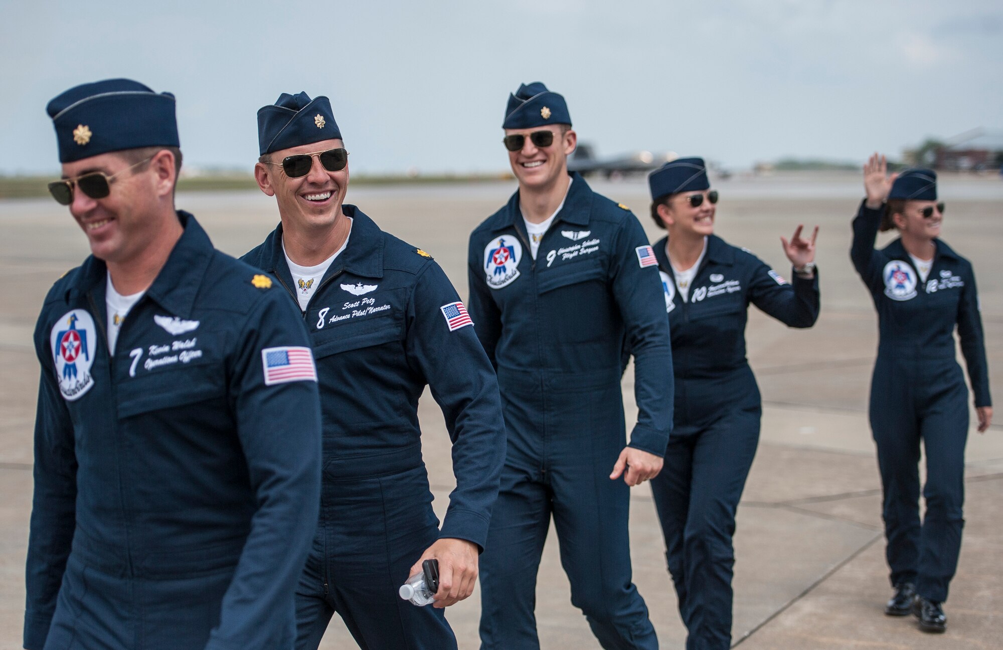 Members of the U.S. Air Force Thunderbirds aerial demonstration team wave to a crowd prior to their performance at the AirPower over Hampton Roads Open House at Langley Air Force Base, Va., April 22, 2016. Millions of people have witnessed the Thunderbirds demonstrations, and in turn, they’ve seen the pride, professionalism and dedication of hundreds of thousands of Airmen serving at home and abroad. (U.S. Air Force photo by Senior Airman Kayla Newman)