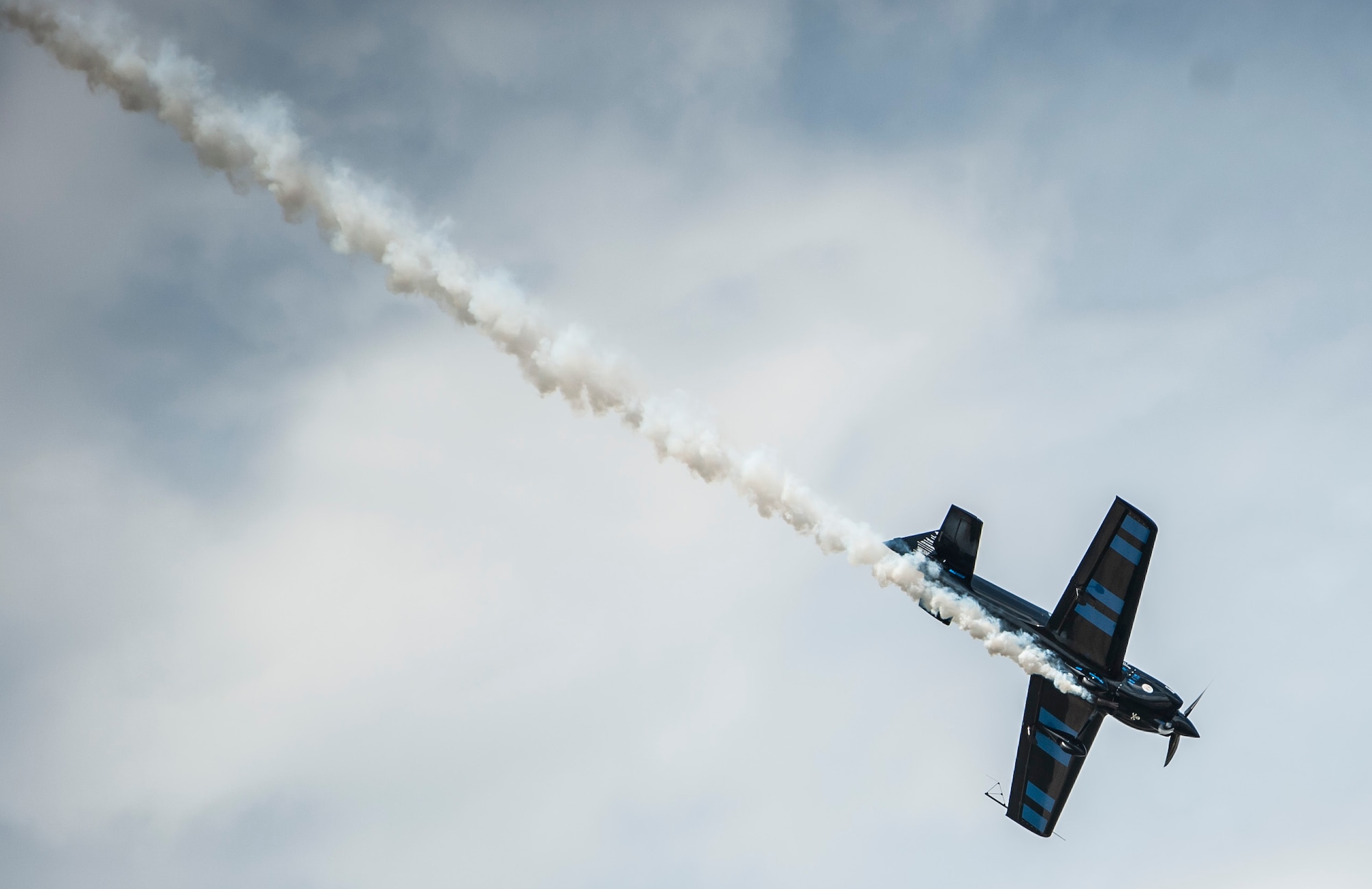 Air show pilot, Rob Holland, performs during the AirPower over Hampton Roads Open House at Langley Air Force Base, Va., April 22, 2016. Holland is a native of New England and flies the MXS-RH aircraft. (U.S. Air Force photo by Senior Airman Kayla Newman)