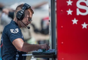 A U.S. Air Force Thunderbirds aerial demonstration team member prepares for a performance at the AirPower over Hampton Roads Open House at Langley Air Force Base, Va., April 22, 2016. The Thunderbirds Show Line consists of 24 professionals in various aircraft maintenance specialties and they are selected before each demonstration season based on their job proficiency, dedication to duty and overall attitude. (U.S. Air Force photo by Senior Airman Kayla Newman)