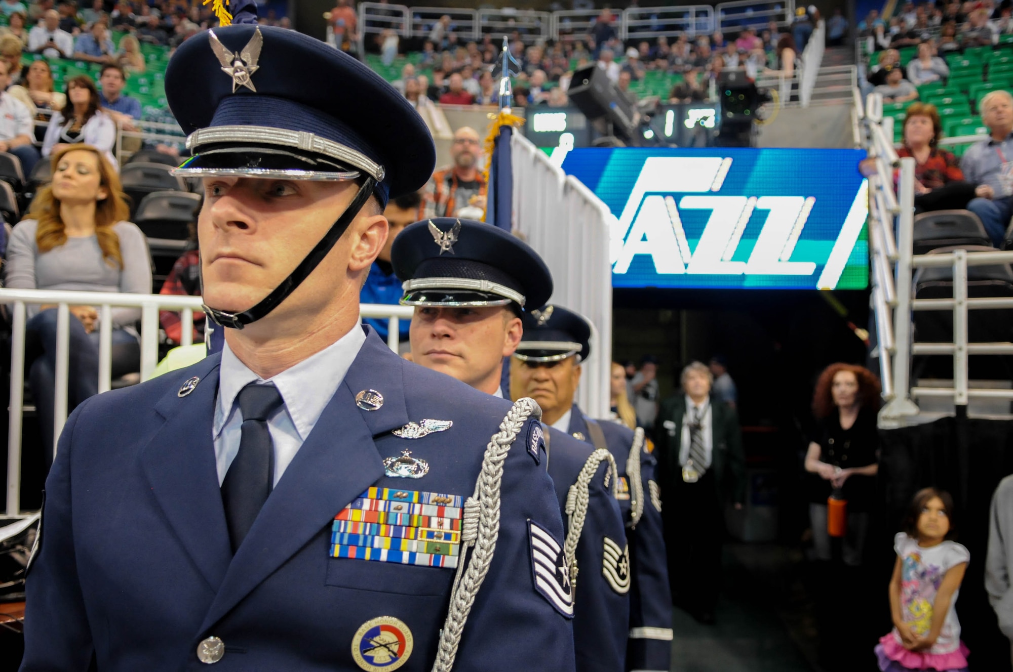 The Utah Air National Guard Honor Guard team presents the colors during the Utah Jazz game April 11, 2016, at the Vivint Smart Home Arena in Salt Lake City. The honor guard team has helped kick off 12 home games this season. (U.S. Air National Guard photo by Senior Airman Colton Elliott/Released)
