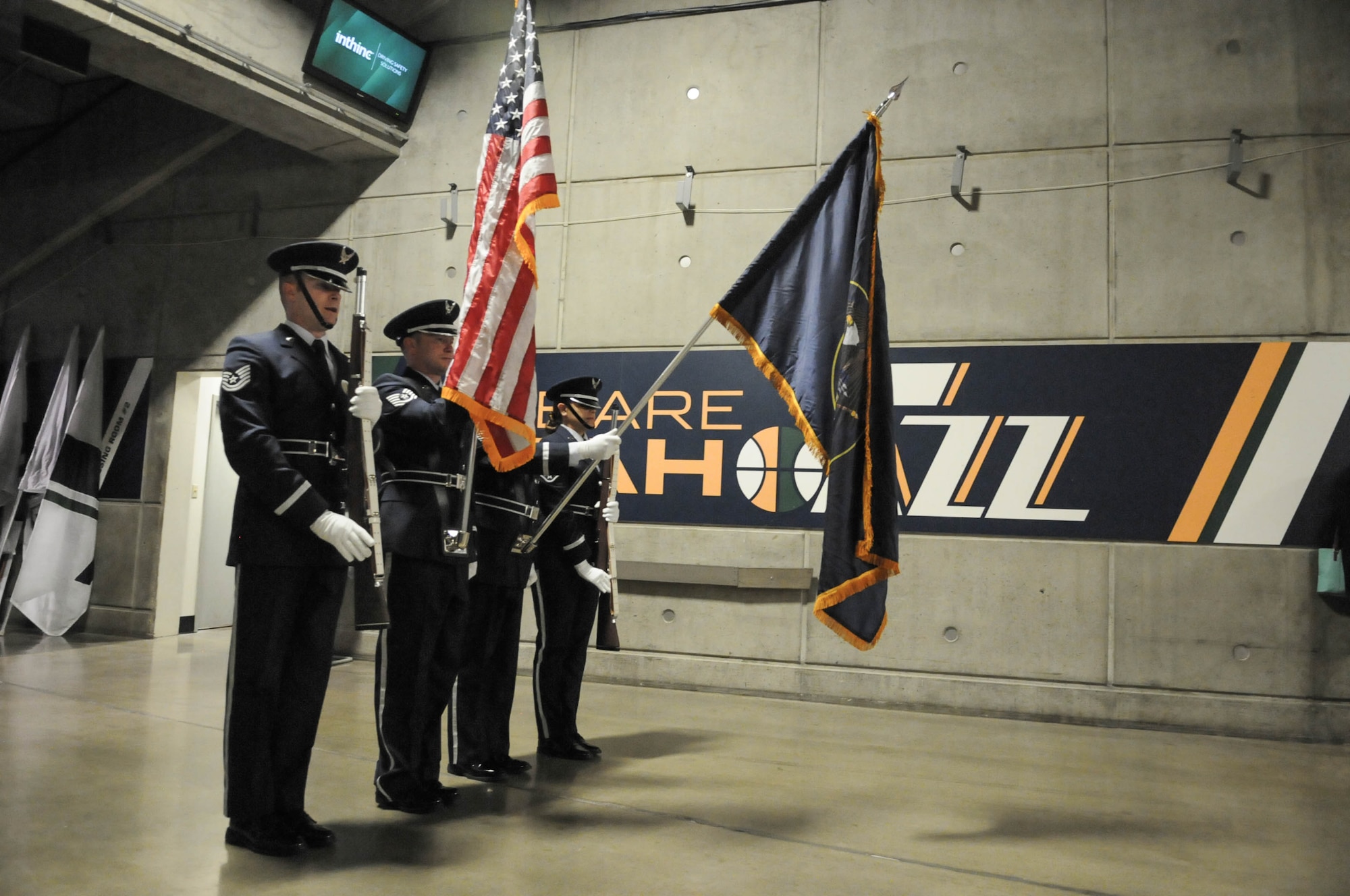 The Utah Air National Guard Honor Guard team presents the colors during the Utah Jazz game April 11, 2016, at the Vivint Smart Home Arena in Salt Lake City. The honor guard team has helped kick off 12 home games this season. (U.S. Air National Guard photo by Senior Airman Colton Elliott/Released)
