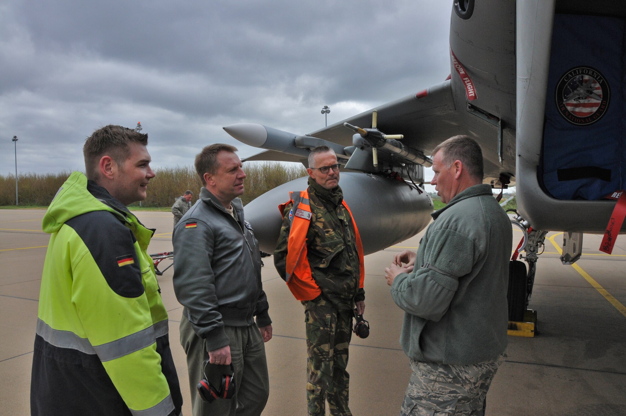 U.S. Air Force and Massachusetts Air National Guard Master Sgt. James Kelley conducts a tour of an F-15C Eagle aircraft for members of the German Air Force maintenance group during the Royal Netherlands Air Force Frisian Flag 2016 exercise, Leeuwarden Air Base, Netherlands, April 19, 2016.  The exercise is designed to foster military cooperation between participating nations and these types of exchanges help establish trust and relationships.   More than 70 aircraft and several hundred personnel from the United States, Netherlands, Belgium, France, Finland, Poland, Norway, United Kingdom, Germany and Australia are taking part. (U.S. Air National Guard photo by 1st Lt. Anthony Mutti /Released)

