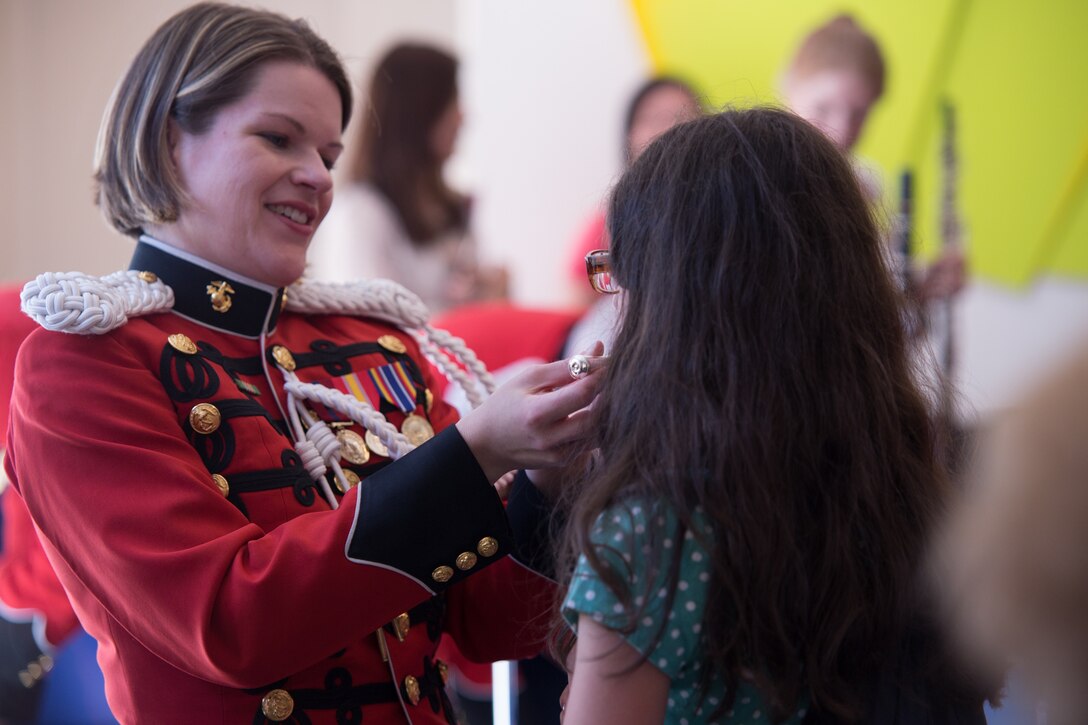 The Marine Band performed the Young People's Concert: Meet the Band, which included an instrument petting zoo, on Sunday, April 24, at Northern Virginia Community College's Rachel M. Schlesinger Concert Hall and Arts Center in Alexandria, Va. (USMC photo by Staff Sgt. Brian Rust/released).