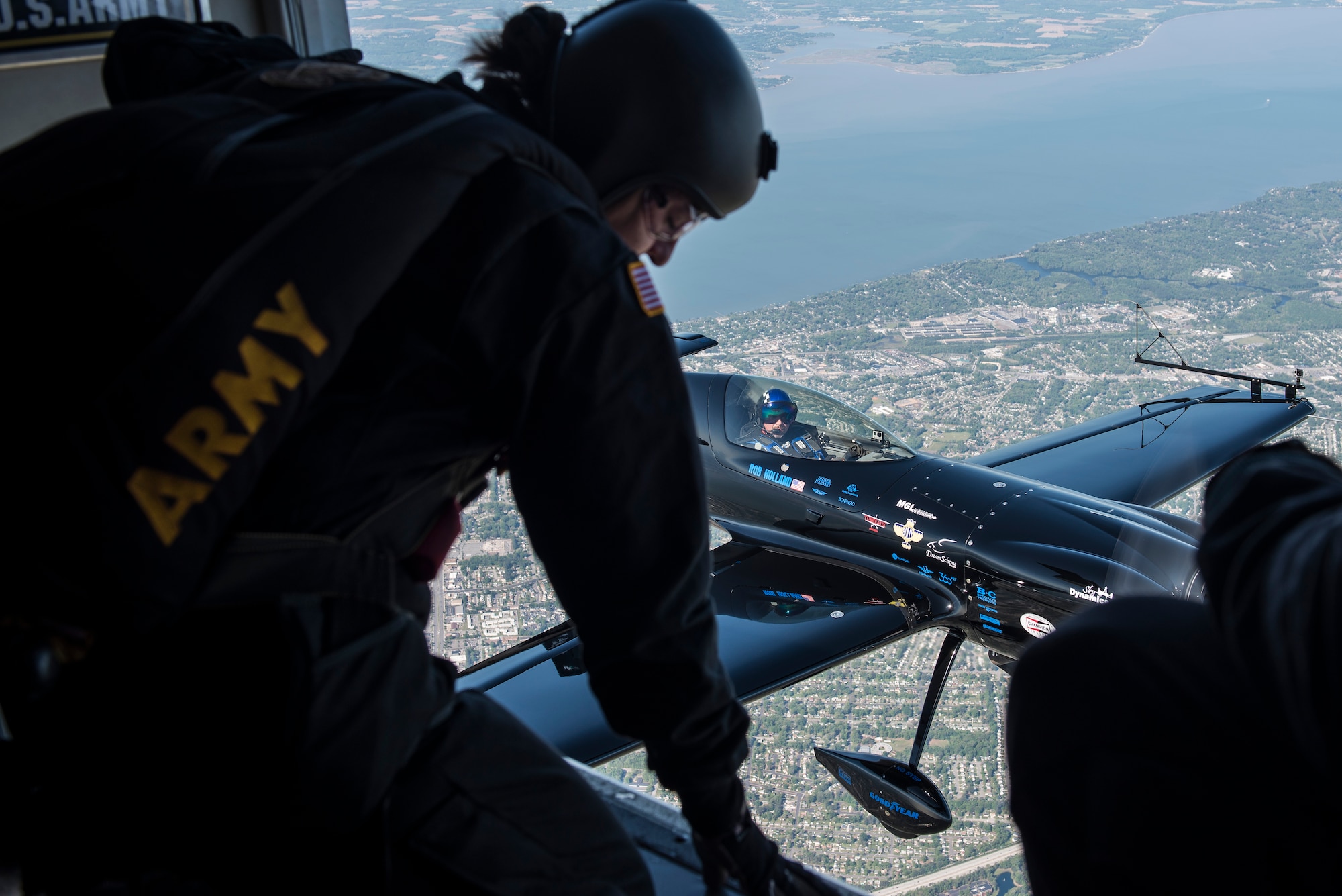 A U.S. Army Golden Knight checks wind speed during the AirPower over Hampton Roads Open House above Langley Air Force Base, Va., April 24, 2016. The team is composed of approximately 95 men and women, which include four parachute units, an aviation unit and a headquarters. (U.S. Air Force photo by Airman 1st Class Derek Seifert)