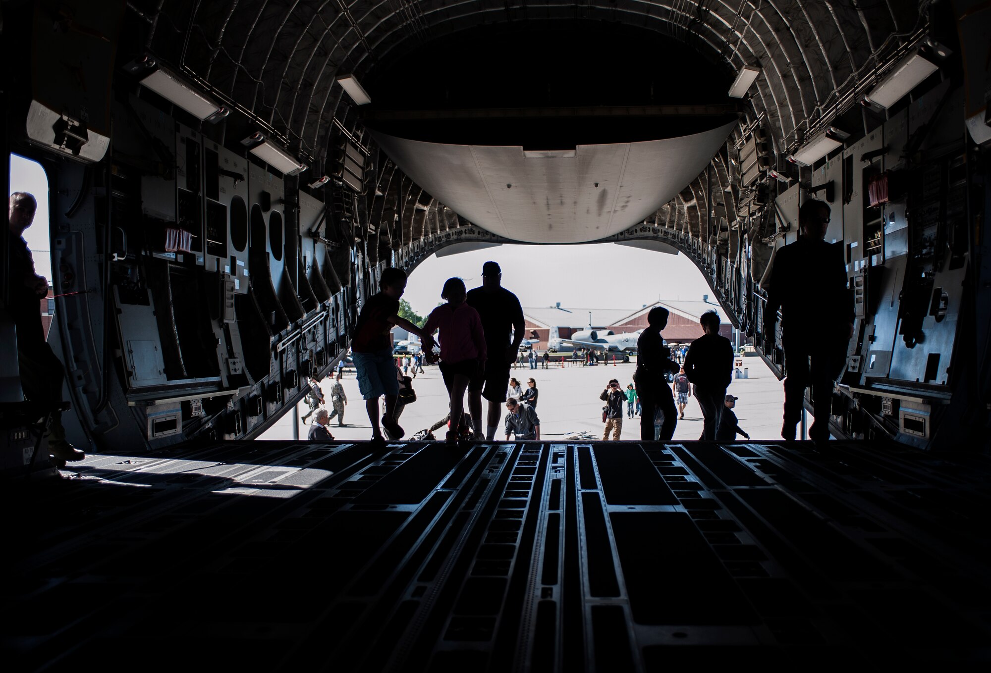 AirPower over Hampton Roads Open House attendees tour a C-17 Globemaster III at Langley Air Force Base, Va., April 24, 2016. The C-17 is the largest military transport aircraft and measures 174 feet long with a wingspan of 169 feet, 10 inches. (U.S. Air Force photo by Airman 1st Class Kaylee Dubois)