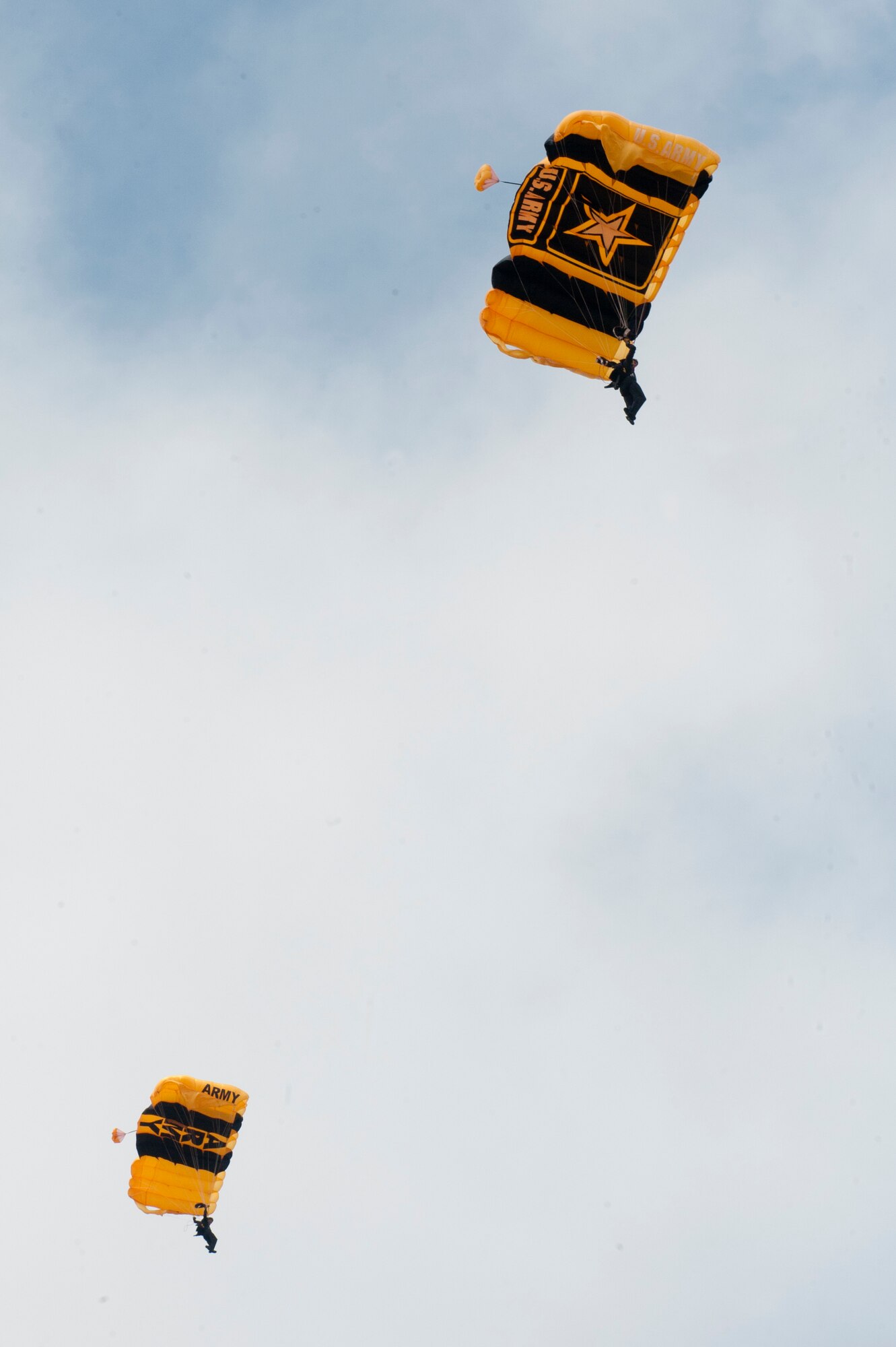 U.S. Army Golden Knights parachute team members descend from a jump during the AirPower over Hampton Roads Open House at Langley Air Force Base, Va., April 23, 2016. The Golden Knights are one of only three Department of Defense-sanctioned aerial demonstration teams, along with the U.S. Navy Blue Angels and the U.S. Air Force Thunderbirds. (U.S. Air Force photo by Senior Airman R. Alex Durbin)