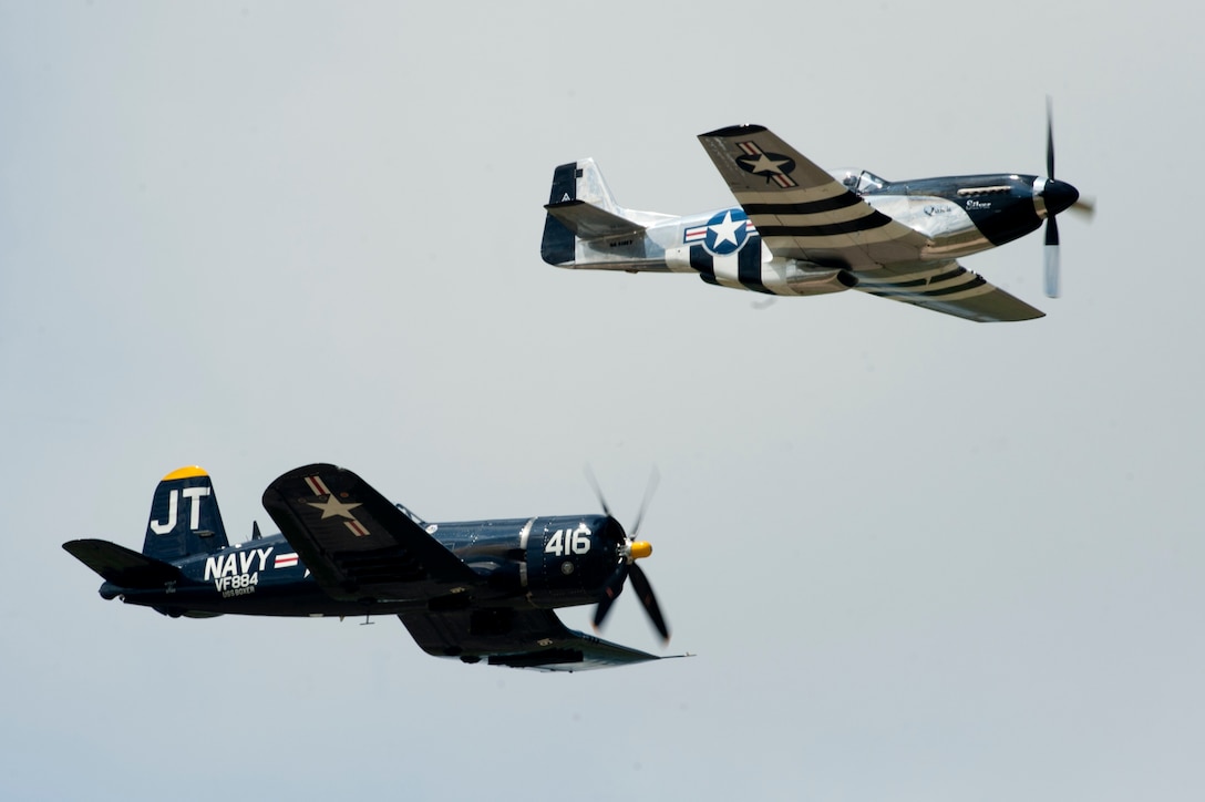 Jim Tobul, Corsair “Korean War Hero” pilot, flies with Scott Yoak, P-51 Mustang “Quicksilver pilot, during the AirPower over Hampton Roads Open House at Langley Air Force Base, Va., April 23, 2016. The pair flew in formation as a tribute to U.S. Service members who lost their throughout the world. (U.S. Air Force photo by Senior Airman R. Alex Durbin)