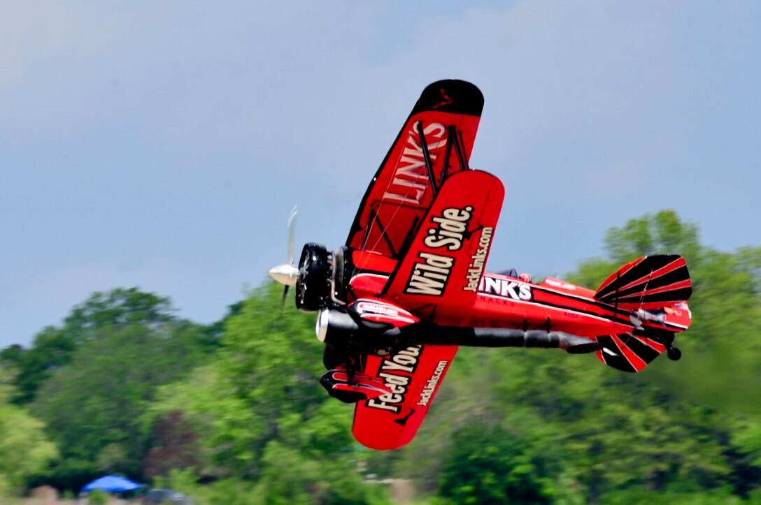 The Jack Link's Screamin' Sasquatch Jet Waco performs during the AirPower over Hampton Roads Open House at Langley Air Force Base, Va., April 23, 2016. The open house educated the public on past and present Air Force aerial capabilities, increase recruiting and show appreciation to the local community. (U.S. Air Force photo by Senior Airman R. Alex Durbin)