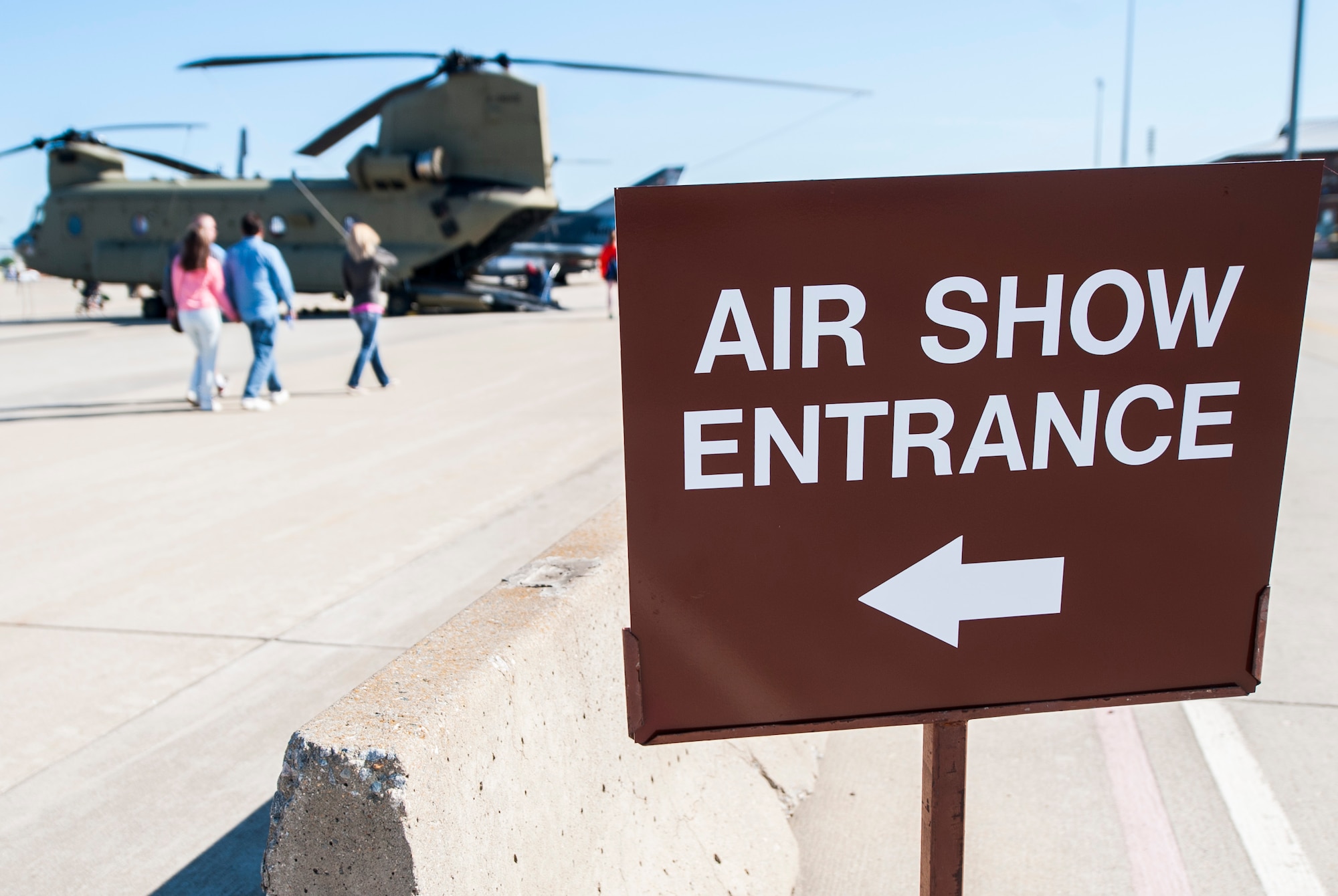 People arrive for the AirPower over Hampton Roads Open House at Langley Air Force Base, Va., April 24, 2016. The open house provided an avenue in which the public witnessed modern and historical military aircraft in action. (U.S. Air Force photo by Senior Airman Kayla Newman)