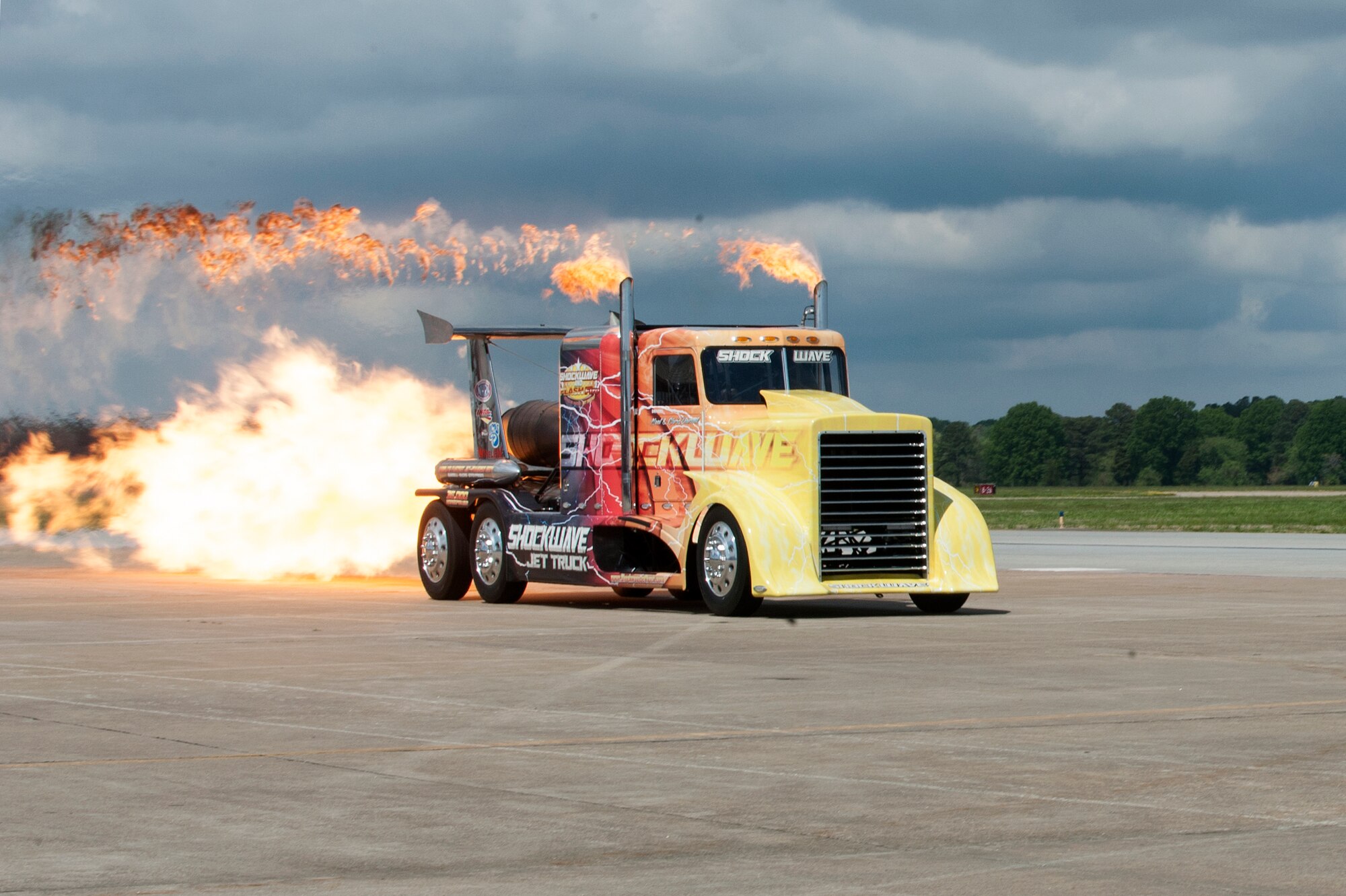 The SHOCKWAVE Jet Truck begins an igniting performance during the AirPower over Hampton Roads Open House at Langley Air Force Base, Va., April 23, 2016. The truck uses more than 36,000 horsepower and holds the Guinness Book World Record for semi-truck speed at 376 miles-per-hour. (U.S. Air Force photo by Airman 1st Class Kaylee Dubois)