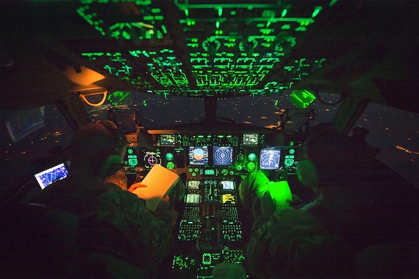 Air Force Capt. Mike Elliott, aircraft commander, and Air Force Capt. Addison Schenk,co-pilot, fly a C-17 after Marine Gen. Joseph F. Dunford Jr., chairman of the Joint Chiefs of Staff, departed Iraqi Kurdistan April 22nd, 2016. Dunford visited Iraq to assess the campaign against the Islamic State of Iraq and the Levant.(DoD Photo by Navy Petty Officer 2nd Class Dominique A. Pineiro)