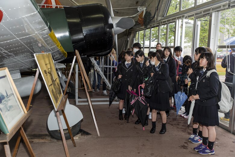 Students from Noda Gakuen High School in Yamaguchi City visit the Zero Hangar at Marine Corps Air Station Iwakuni, Japan, April 21, 2016. The Students traveled to MCAS Iwakuni as part of a interscholastic exchange with Matthew C. Perry High School. Events like these help secure the two nations’ relationship with positive activities that educate both students about each other’s culture. (U.S. Marine Corps photo by Lance Cpl. Aaron Henson/Released)