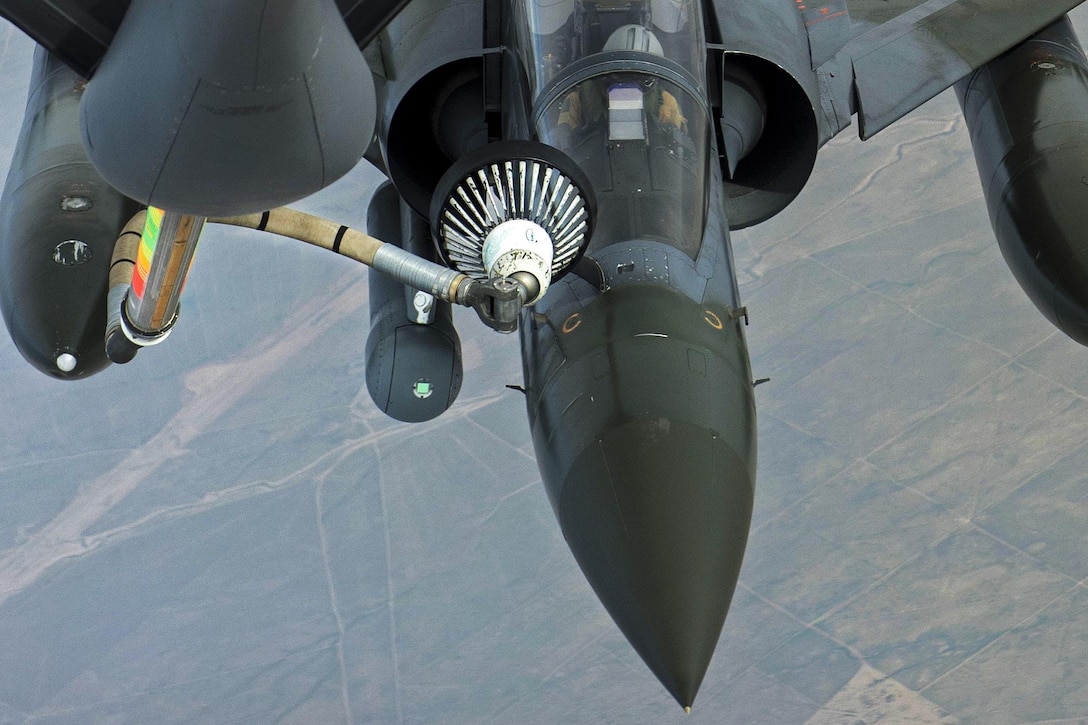 A close-up of a French Mirage 2000D aircraft receiving fuel from a U.S Air Force KC-135 Stratotanker aircraft over Iraq in support of Operation Inherent Resolve, April 8, 2016. Air Force photo by Staff Sgt. Corey Hook