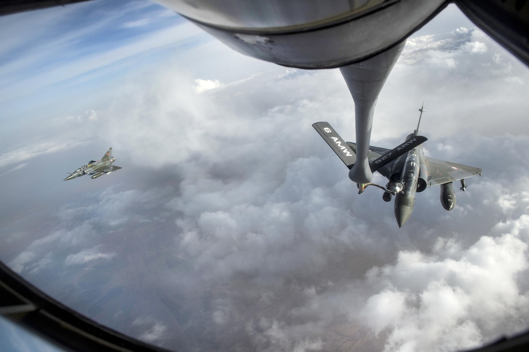 Two French Mirage 2000D aircraft prepare to receive fuel from a U.S Air Force KC-135 Stratotanker aircraft over Iraq in support of Operation Inherent Resolve, April 8, 2016. Air Force photo by Staff Sgt. Corey Hook