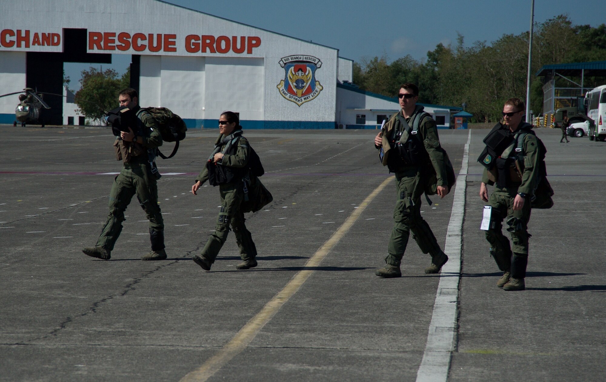 U.S. Air Force pilots step to the A-10C Thunderbolt II before taking off from Clark Air Base, Philippines, on a maritime domain awareness mission in the vicinity of Scarborough Shoal April 21, 2016. The pilots are deployed along with five A-10Cs, three HH-60G Pave Hawks and 200 Airmen as part of U.S. Pacific Command’s first Air Contingent in order to promote interoperability with Philippine counterparts and provide transparent maritime situational awareness, ensuring safety of military and civilian operations in international waters and airspace. (U.S. Air Force photo by Capt. Susan Harrington)