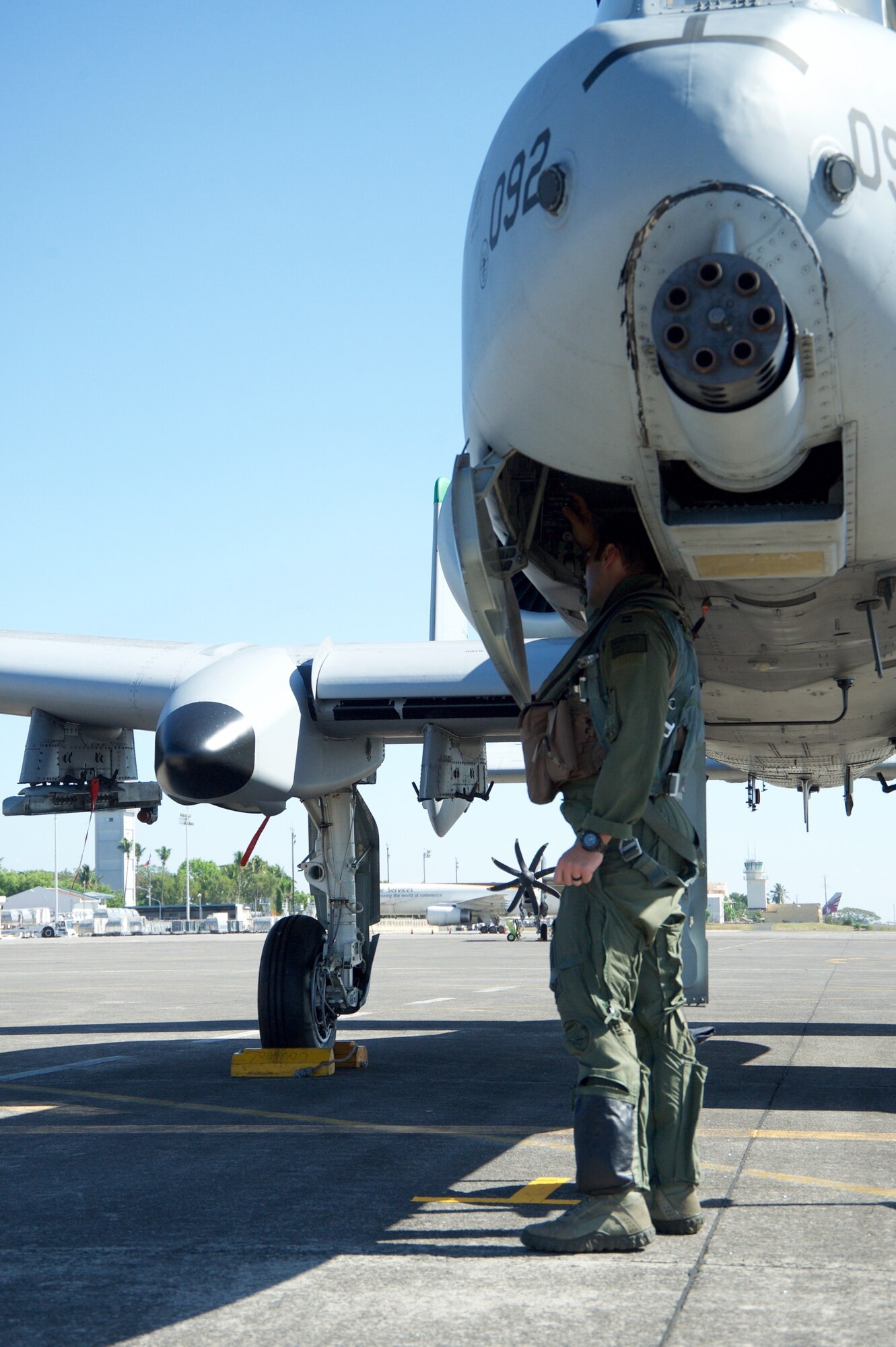 U.S. Air Force Capt. John Meyers conducts a pre-flight check on an A-10C Thunderbolt II aircraft at Clark Air Base, Philippines, before flying a maritime domain awareness mission over international waters west of the Philippines April 21, 2016. Meyers, along with five A-10Cs, three HH-60G Pave Hawks and 200 Airmen are deployed as part of U.S. Pacific Command’s first Air Contingent. The stand up of the Air Contingent at the invitation of the Philippine government is just one way the U.S. exercises continued presence and commitment to partners and allies in the region. (U.S. Air Force photo by Capt. Susan Harrington)